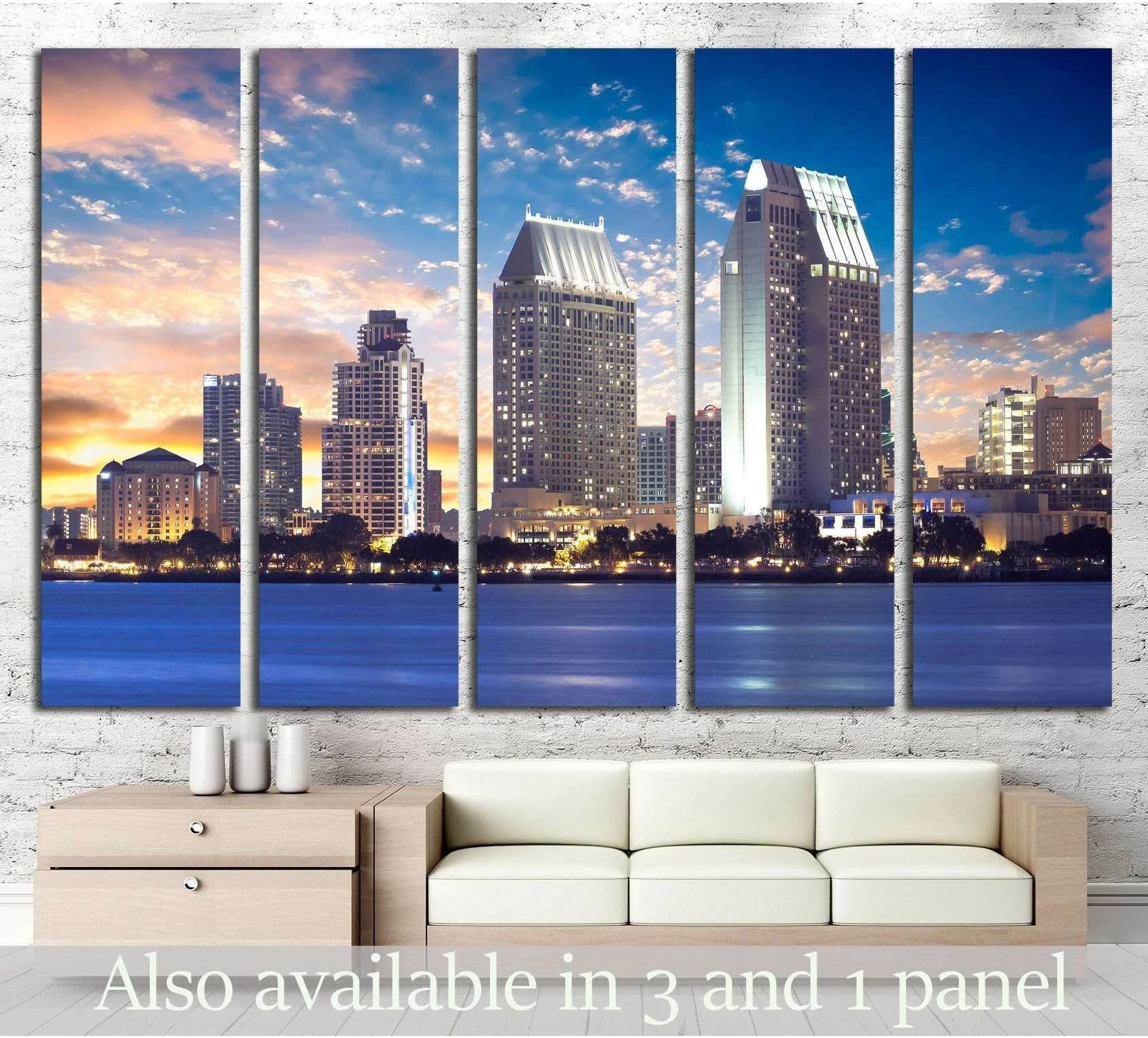 San Diego skyline canvas print at sunset above sofa in a modern living room