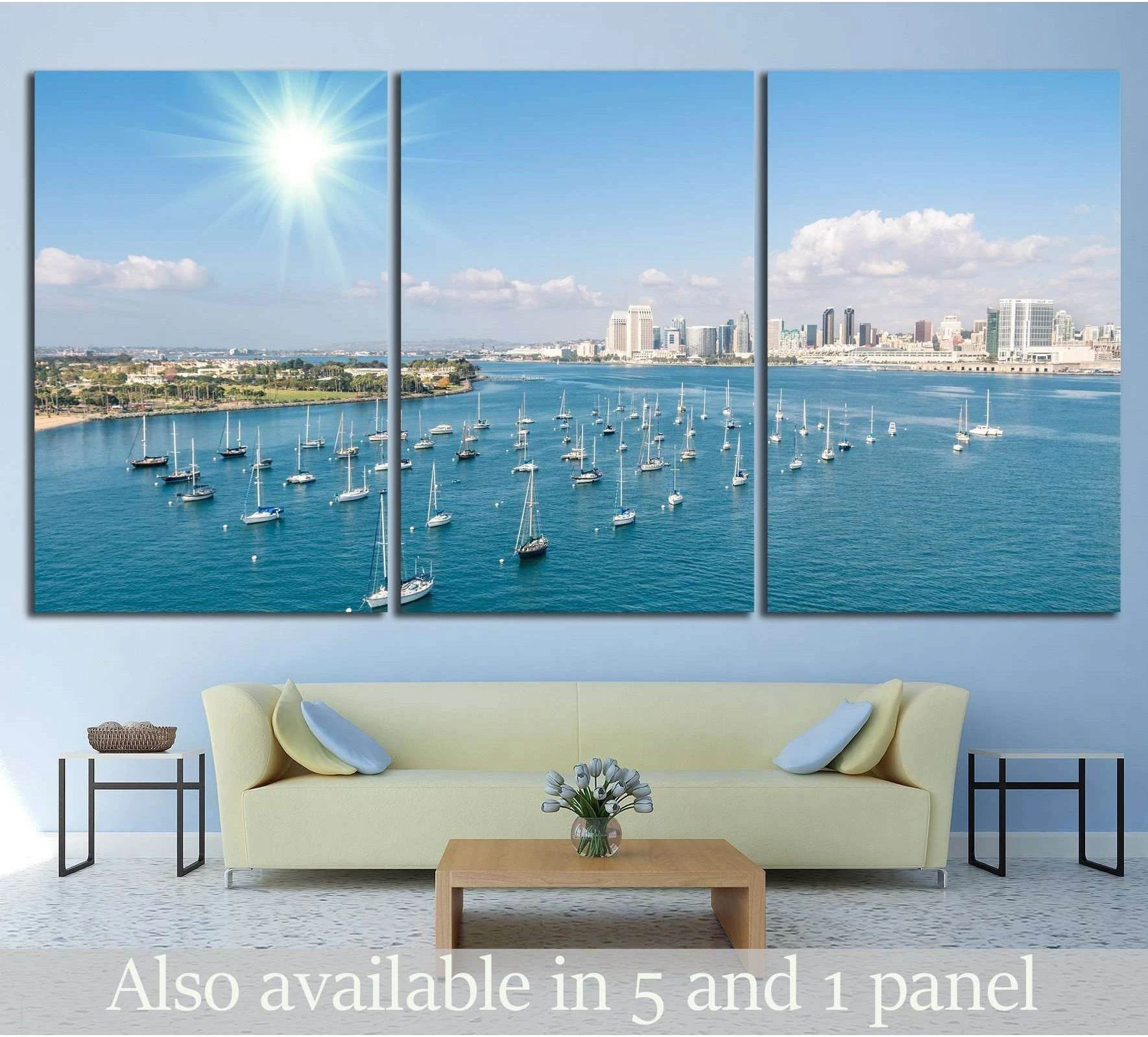 San Diego skyline canvas print with sailboats on blue harbor, displayed above sofa in modern living room