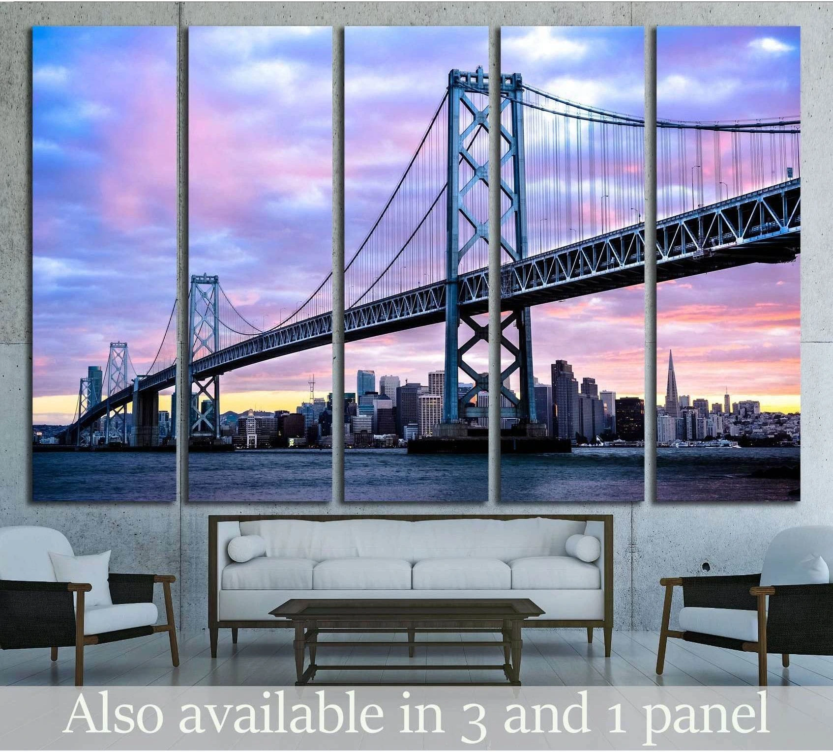 San Francisco Bay Bridge canvas print with pastel sunset sky and skyline, hung above a sofa in a modern living room