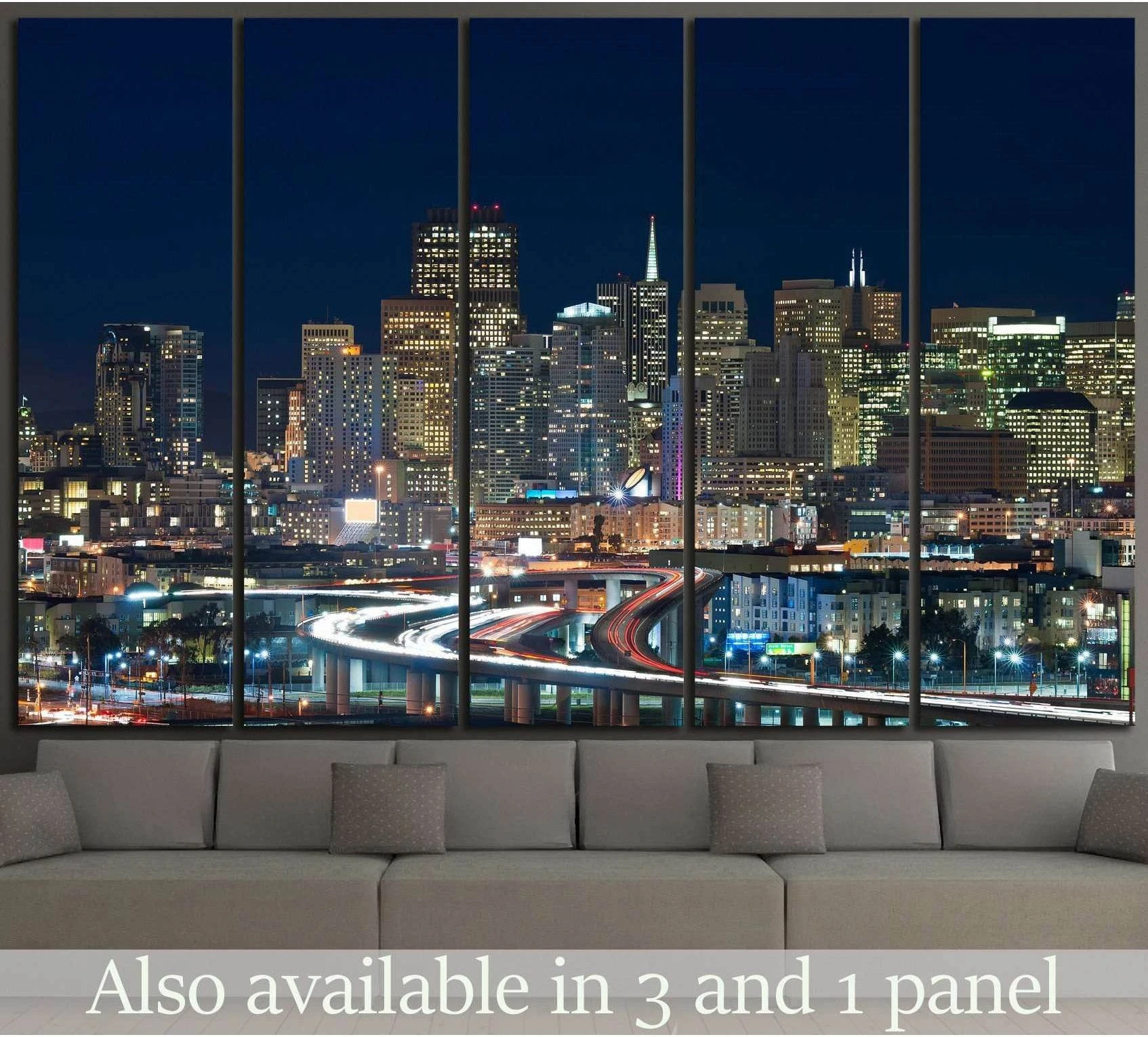 San Francisco skyline canvas print with freeway light trails at night above sofa in modern living room