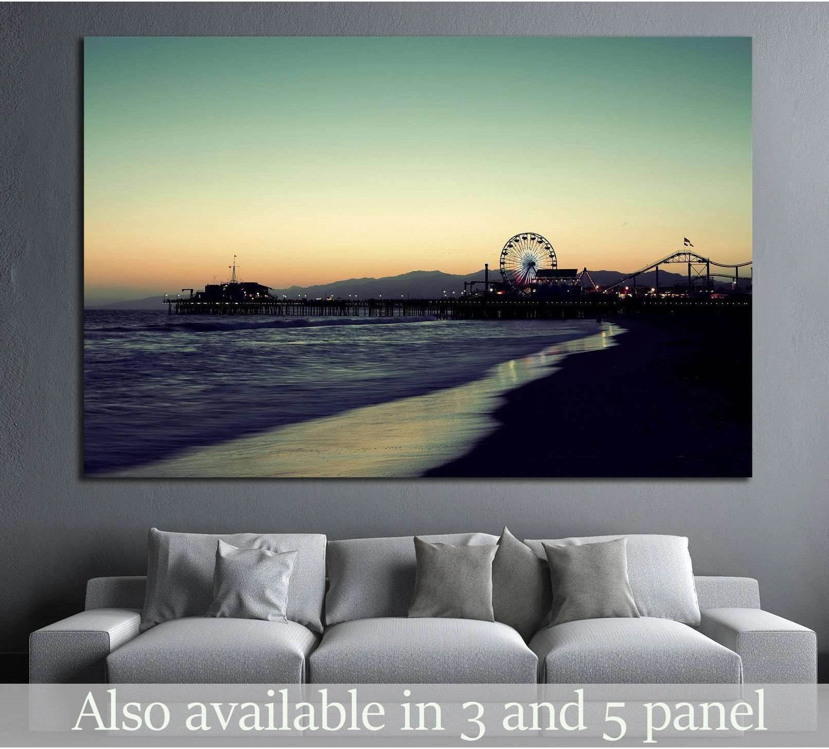 Santa Monica Pier sunset canvas print with Ferris wheel above sofa in a modern living room