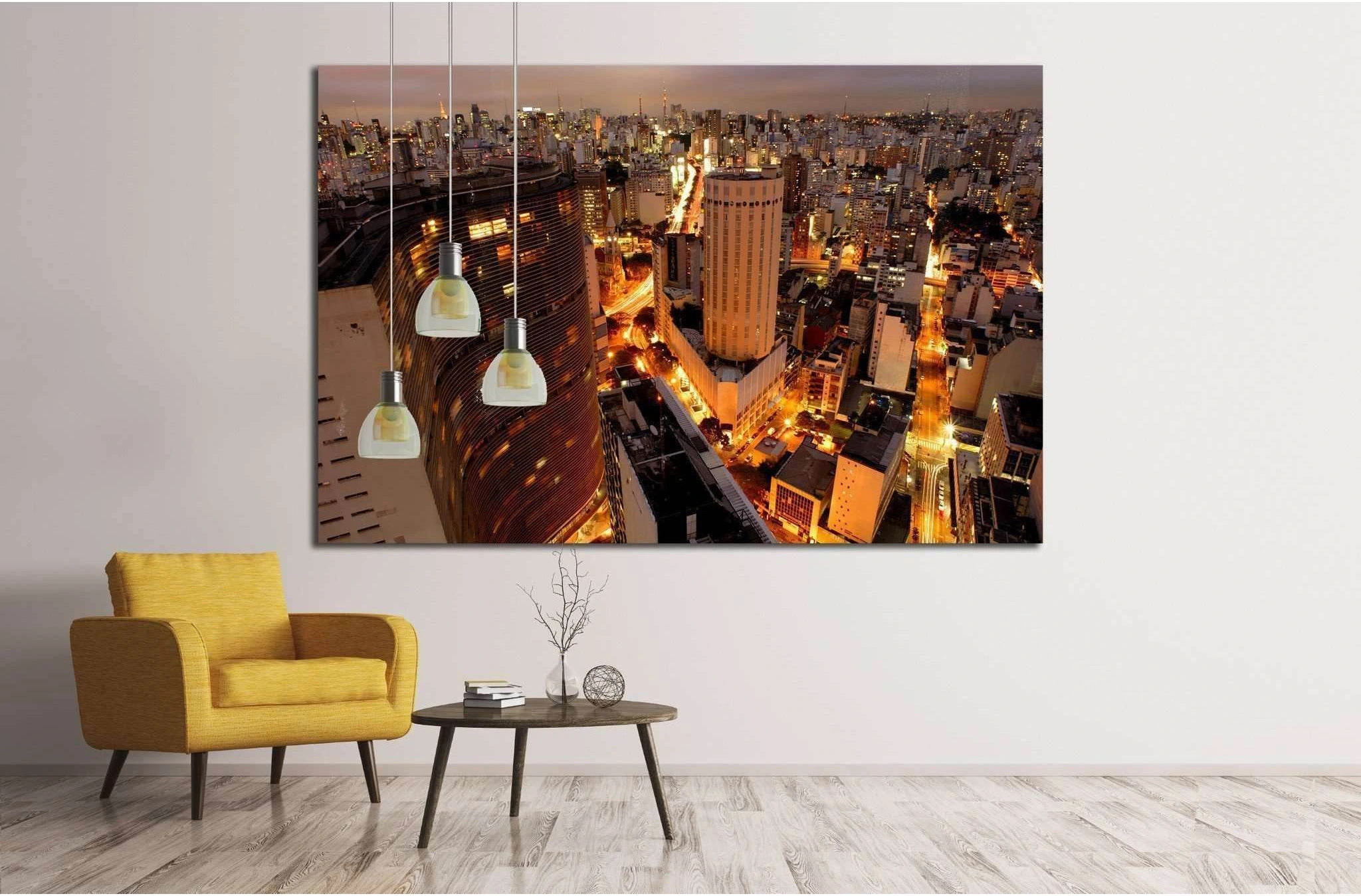 Sao Paulo skyline canvas print with glowing city lights at dusk above a table in a modern room