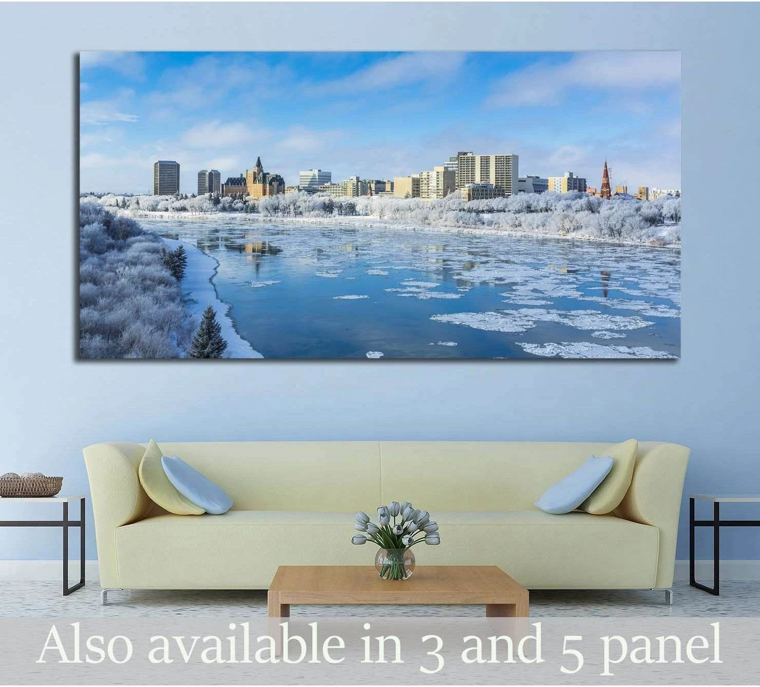 Saskatoon skyline canvas print above sofa with snowy riverfront and winter cityscape