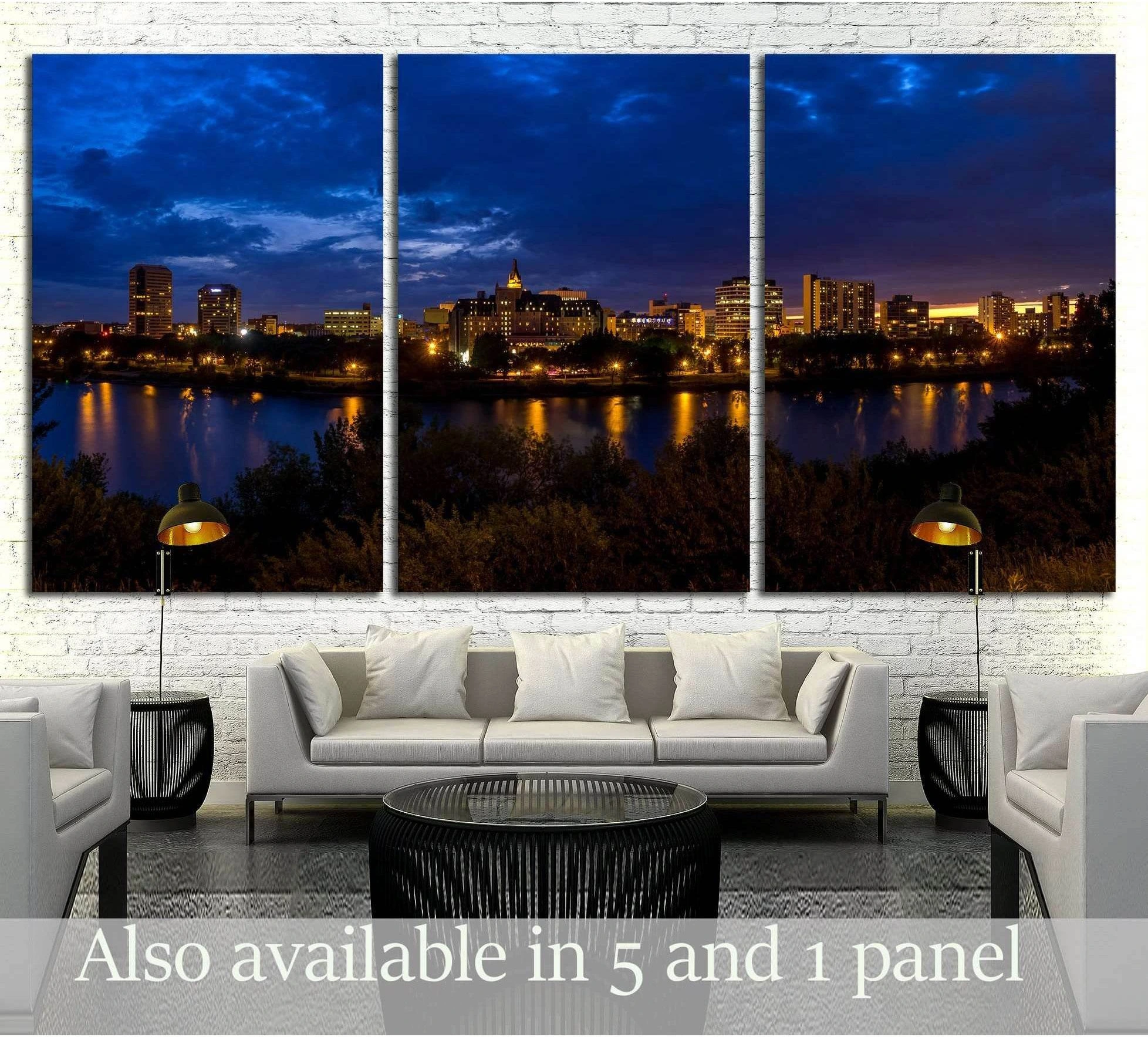 Saskatoon night skyline canvas print above a sofa with river reflections and deep blue evening sky