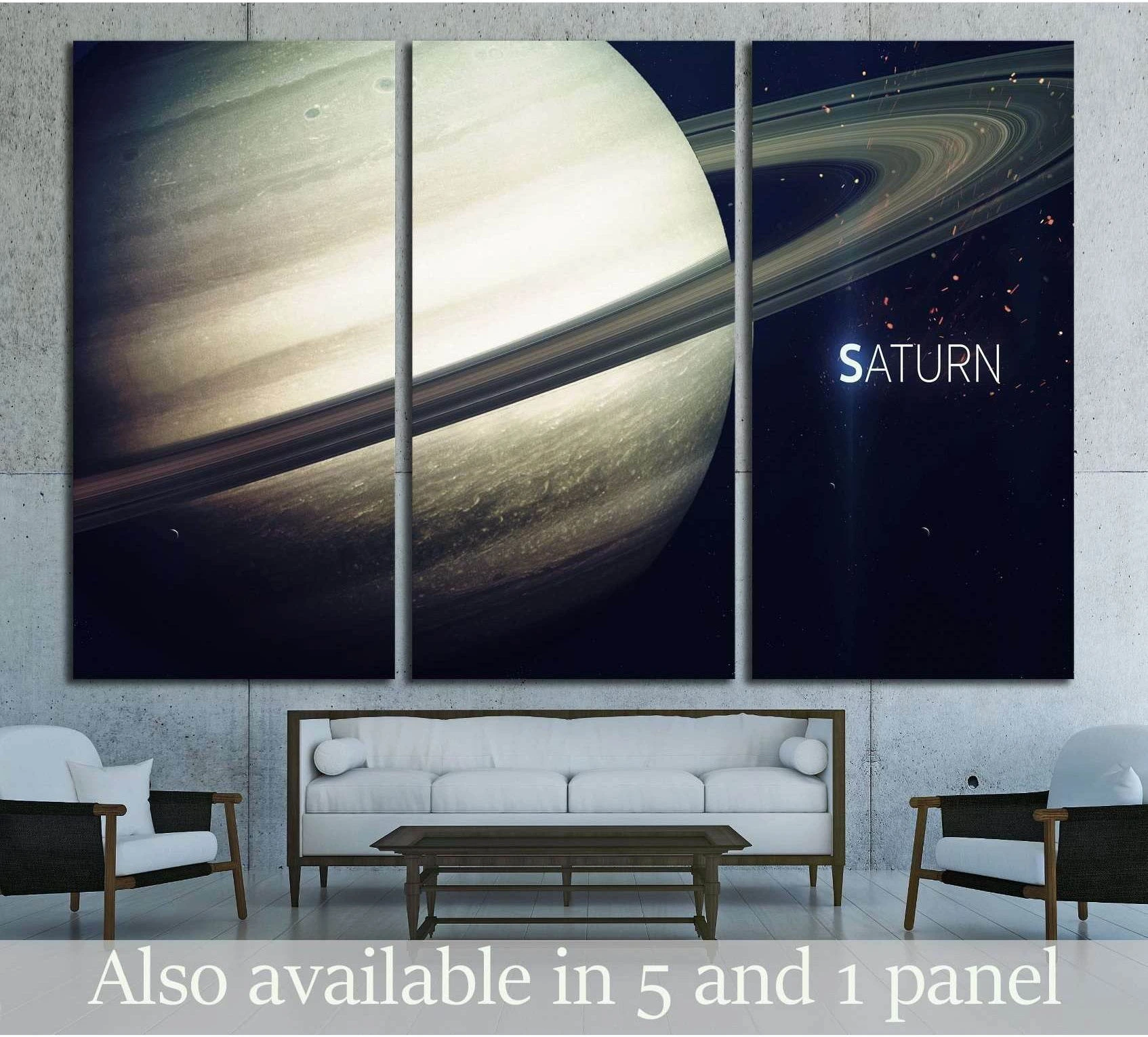 Saturn triptych canvas print with sweeping rings above a sofa in a modern living room