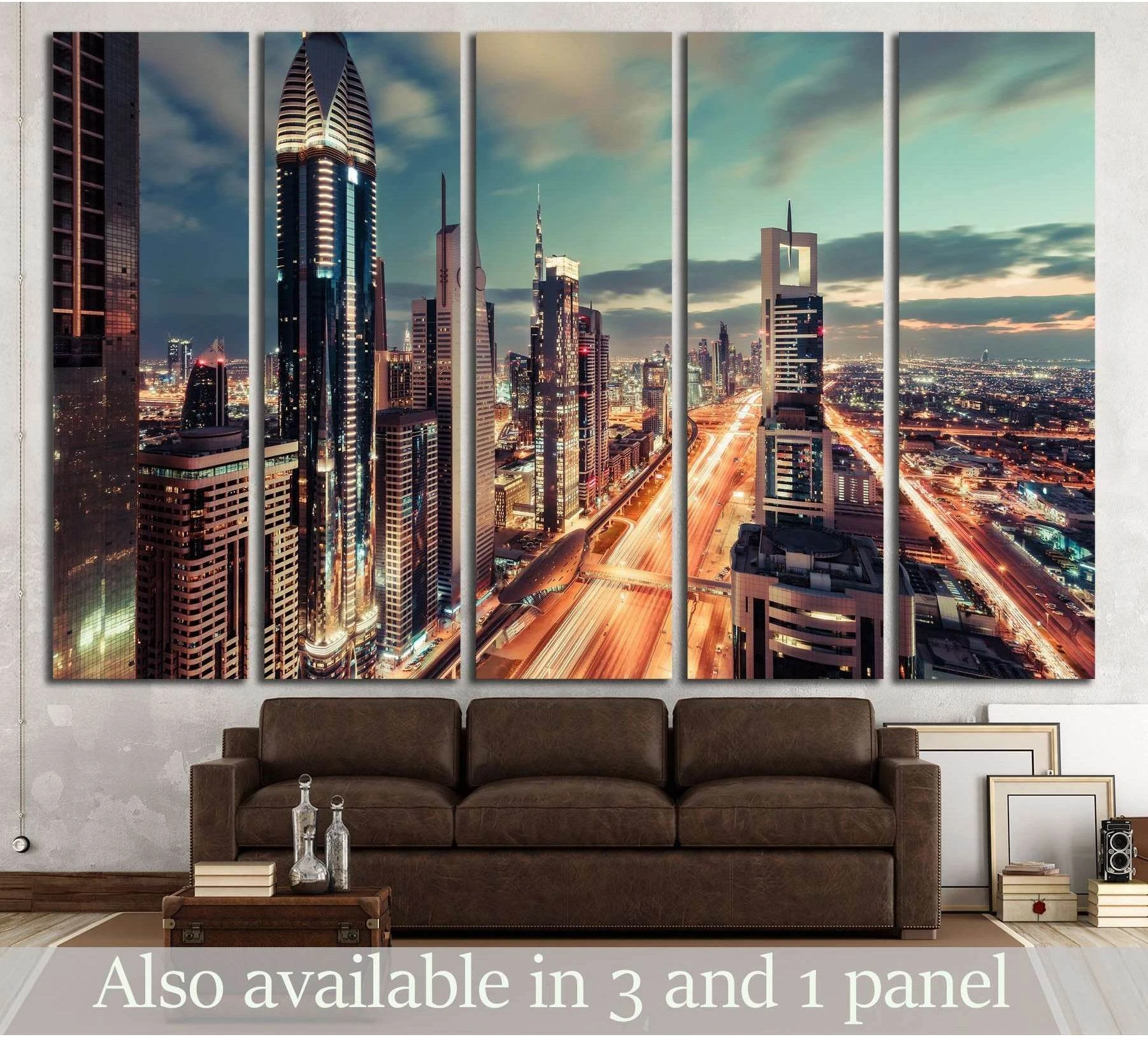 Dubai skyline canvas print above sofa in modern living room with glowing evening city lights and highway view