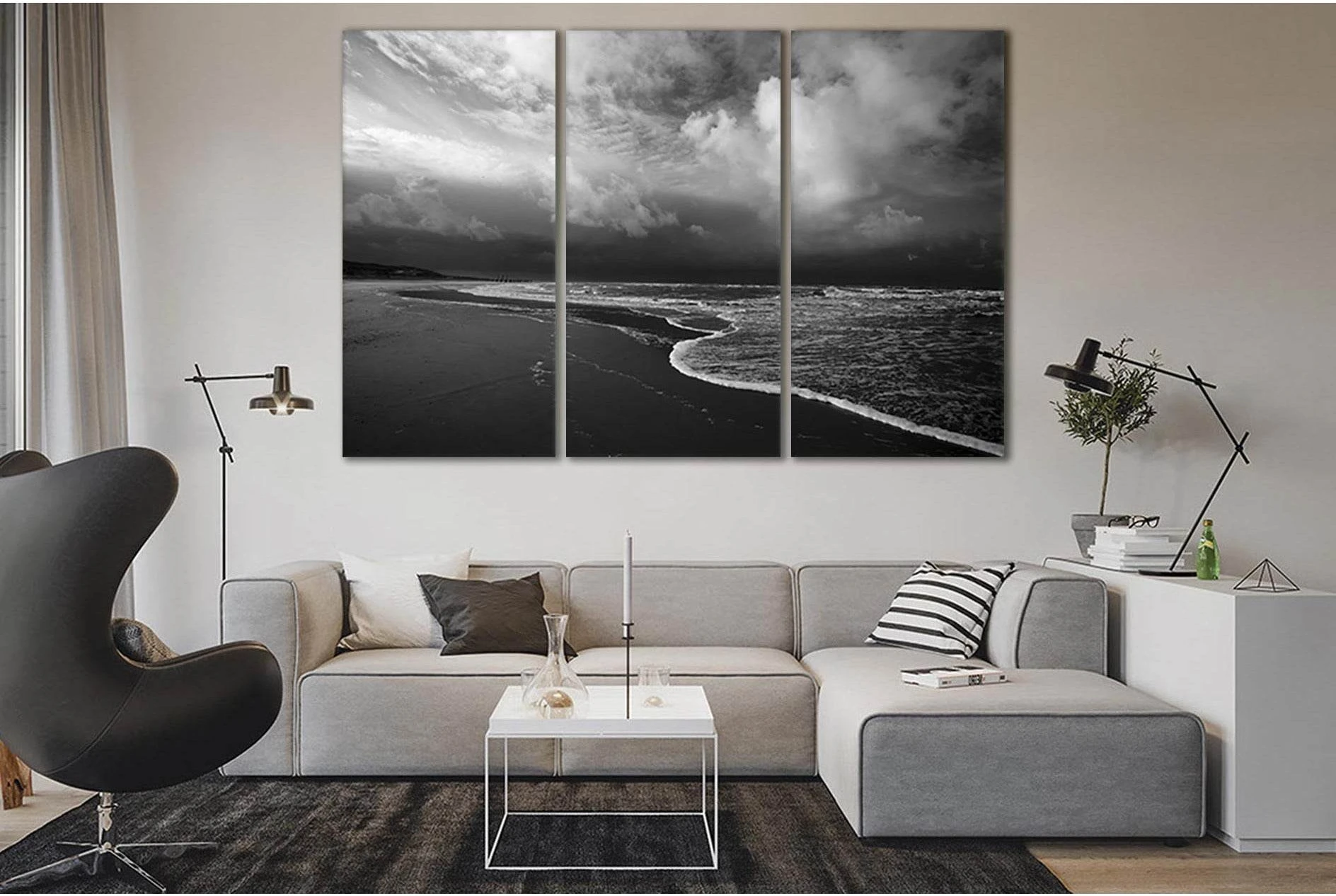 Black and White Sea Beach Canvas Print in Three Panels showing sea water, shoreline and horizon depth.