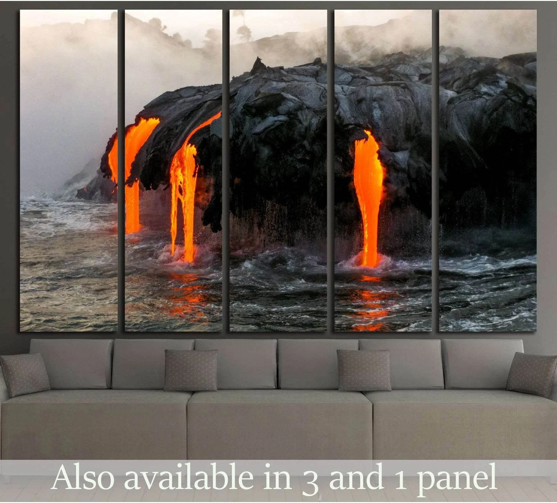 Kilauea volcano canvas print with lava flowing into the ocean above a sofa in a modern living room