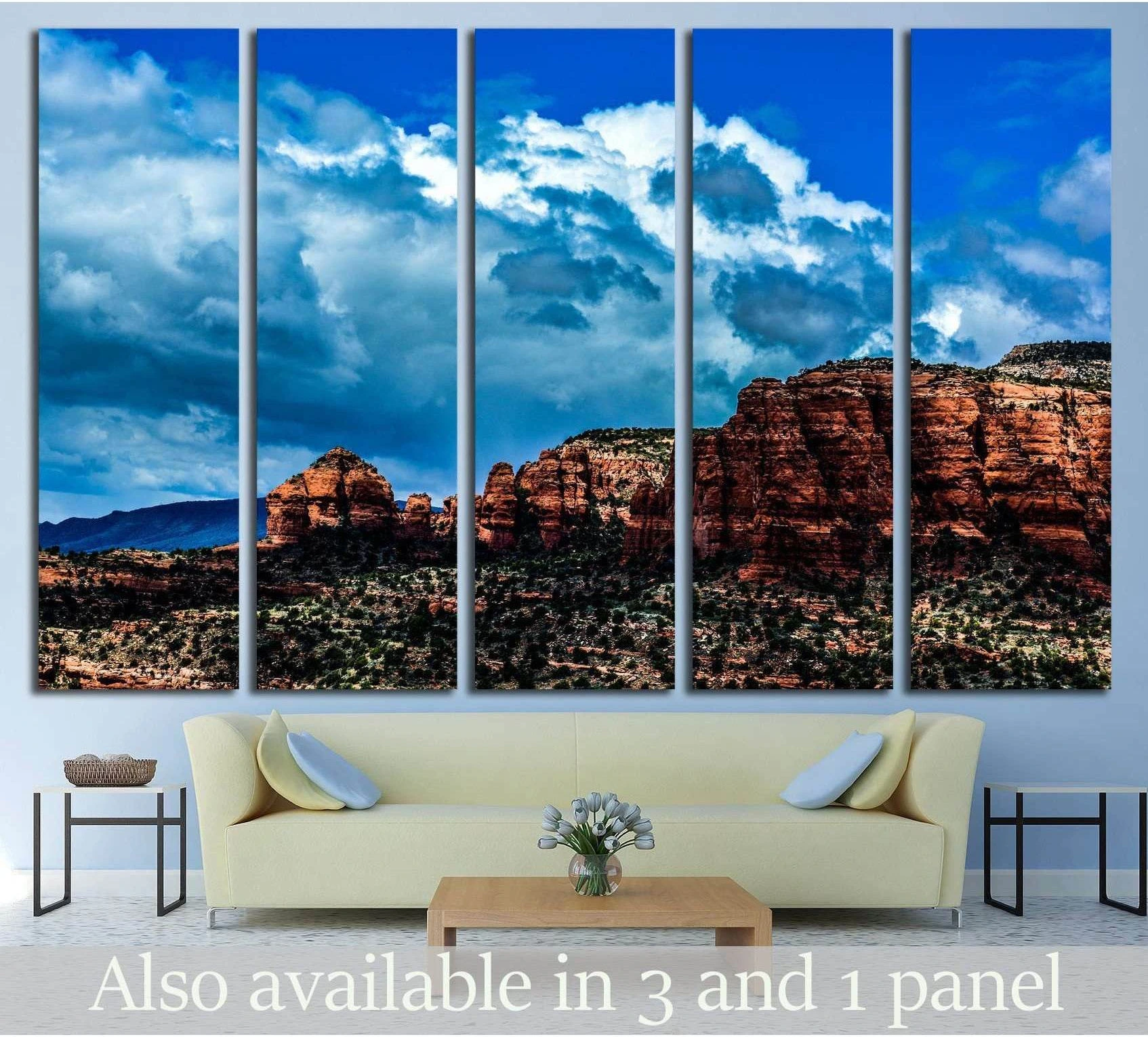 Sedona red rocks panoramic canvas print above a sofa in a modern living room with dramatic Arizona sky