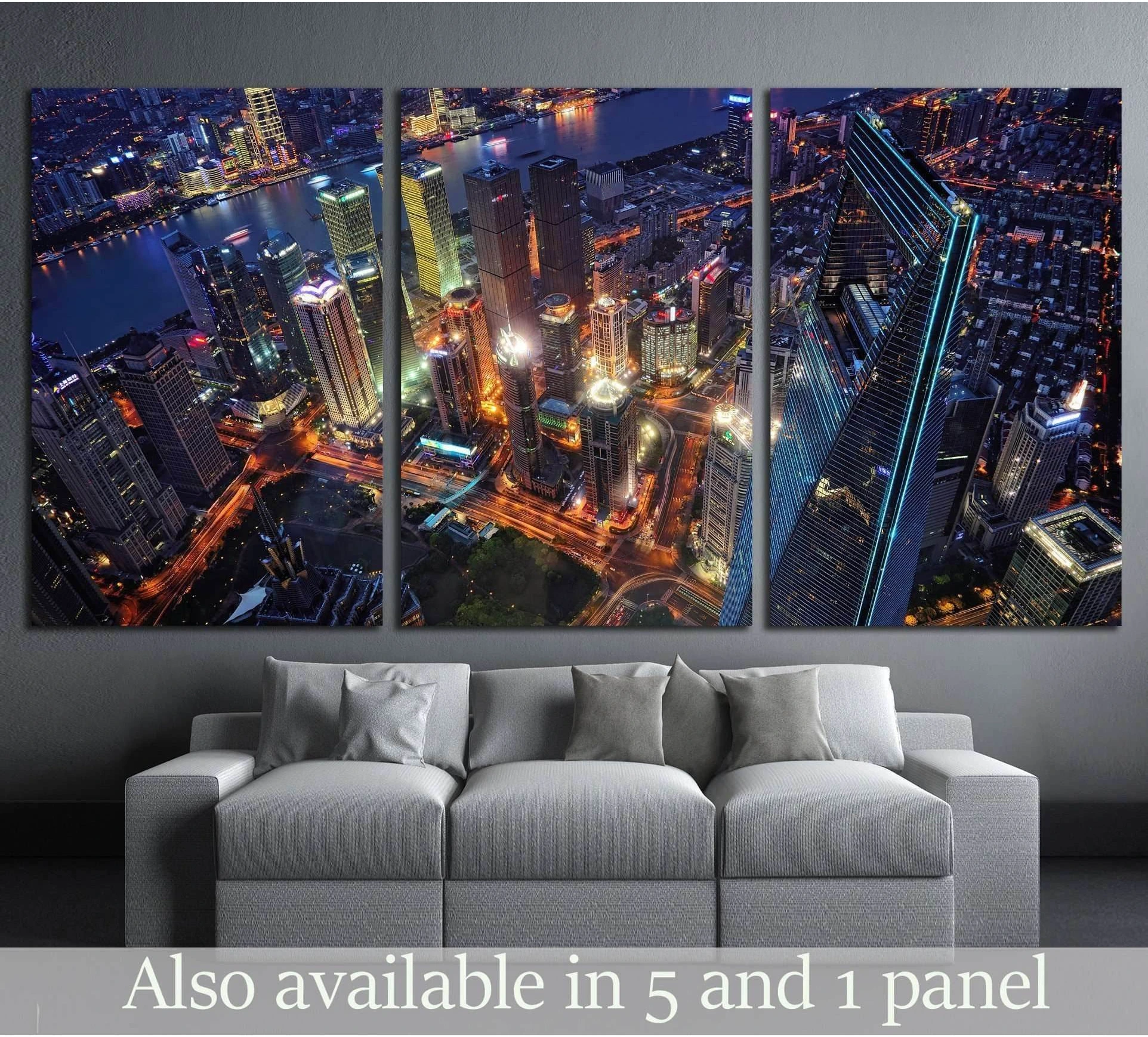 Shanghai skyline triptych canvas print with neon skyscrapers above a sofa in a modern living room