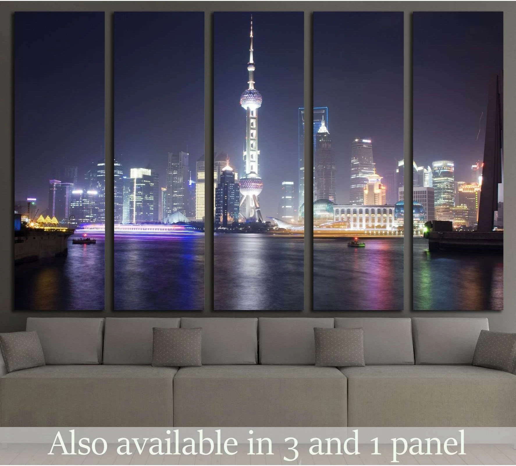 Shanghai skyline canvas print with Oriental Pearl Tower at night, displayed above a sofa in a modern living room