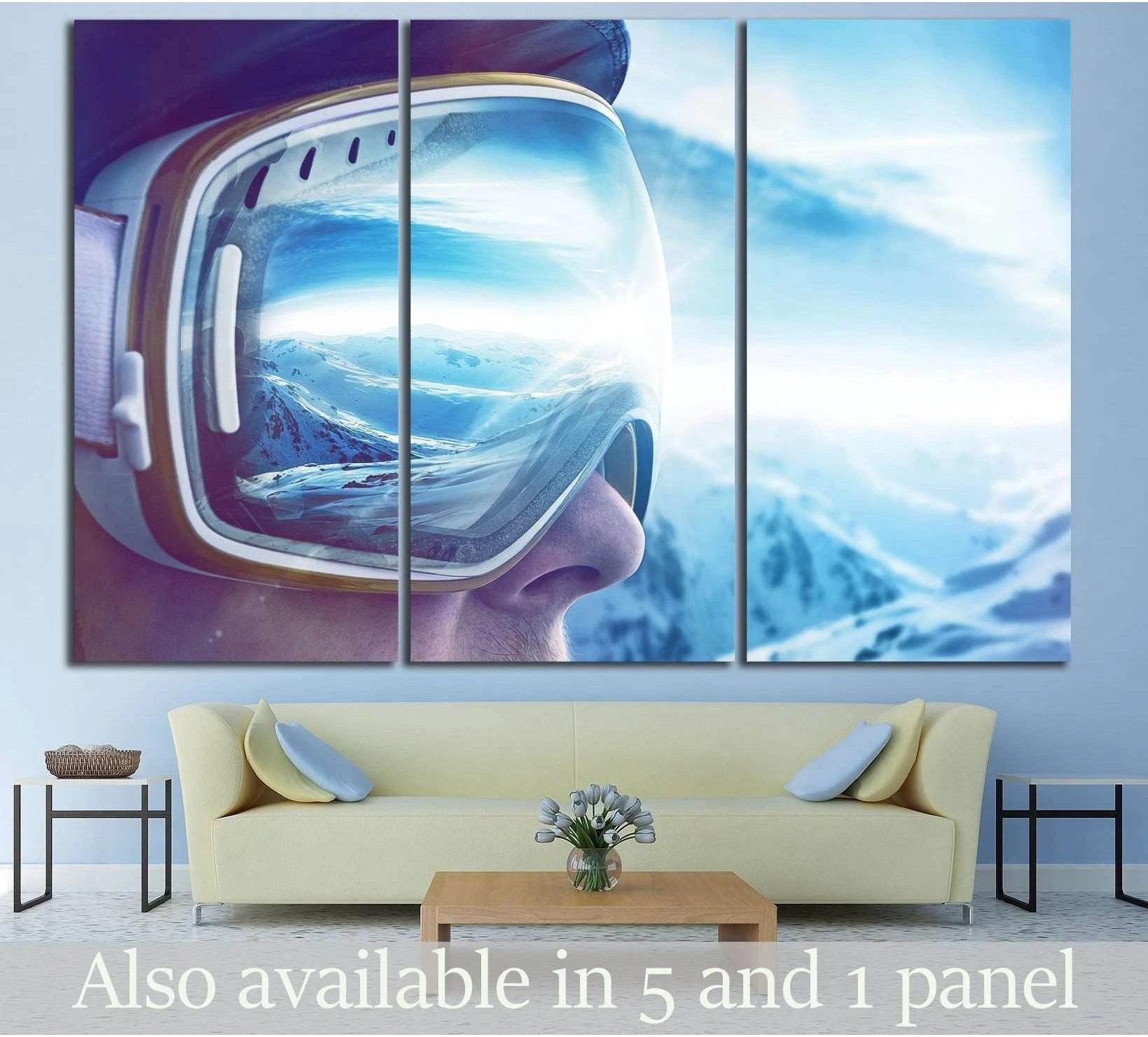 Skier wearing reflective goggles canvas print with alpine mountain view in blue triptych