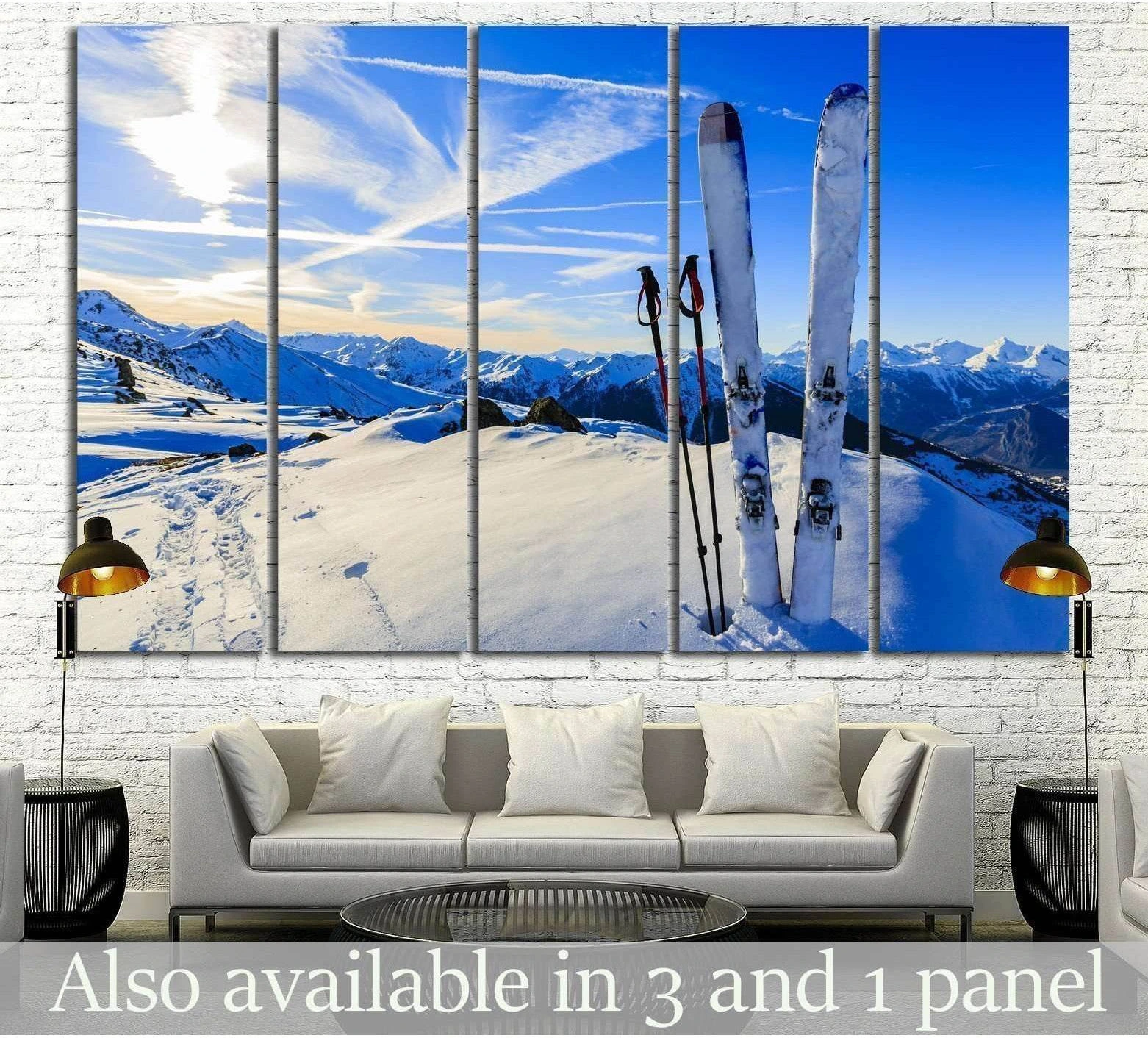 Skis and poles in alpine snow canvas print above sofa in a modern ski lodge living room