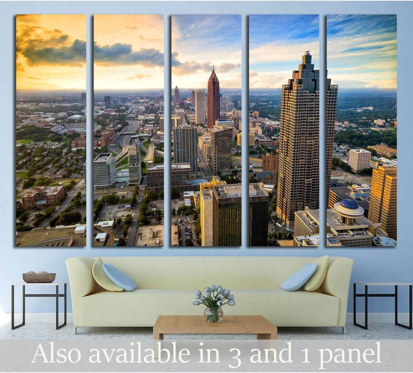 Atlanta skyline canvas print in five panels above a sofa with golden sunset clouds over downtown skyscrapers