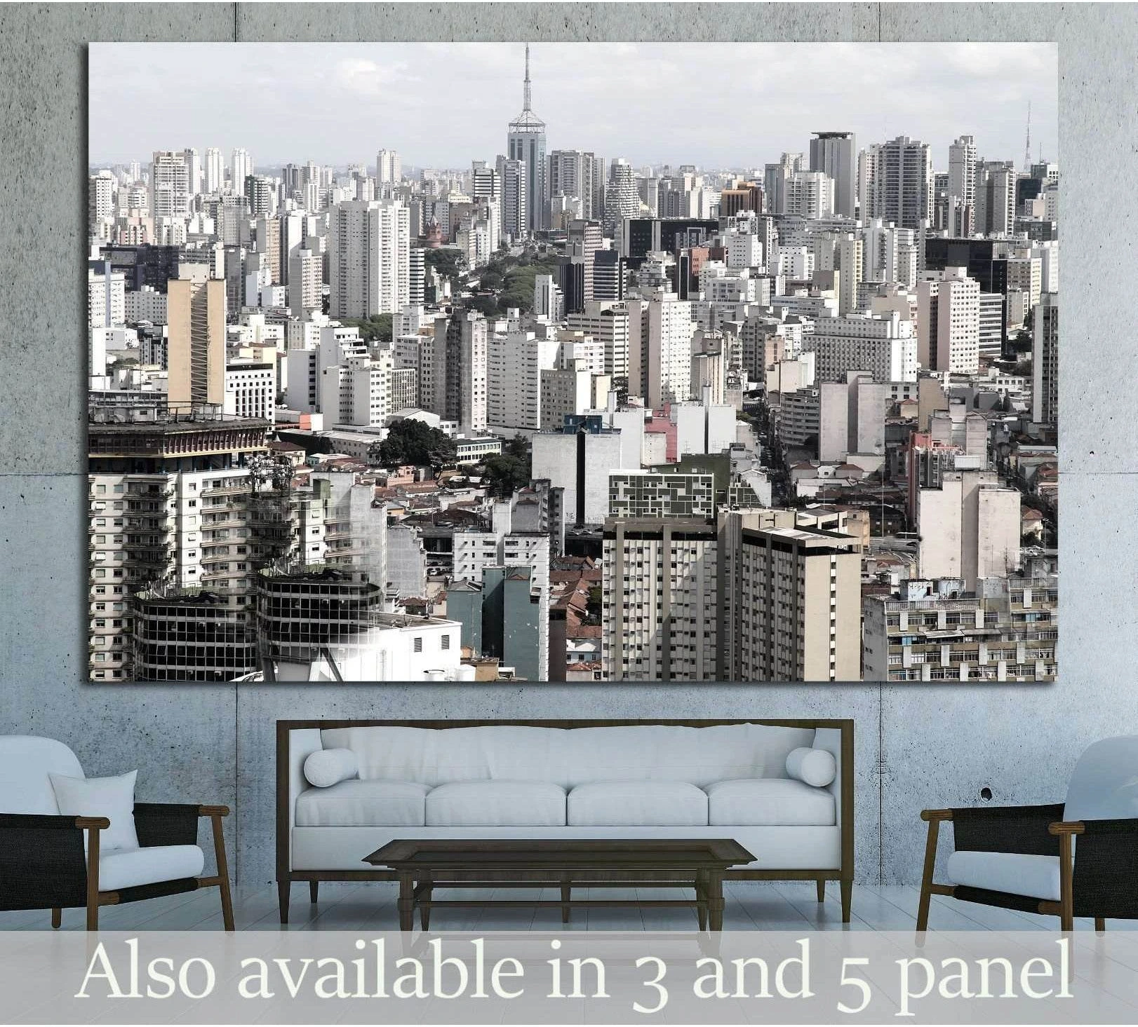 São Paulo skyline canvas print with dense gray high-rise cityscape above a sofa in a modern living room