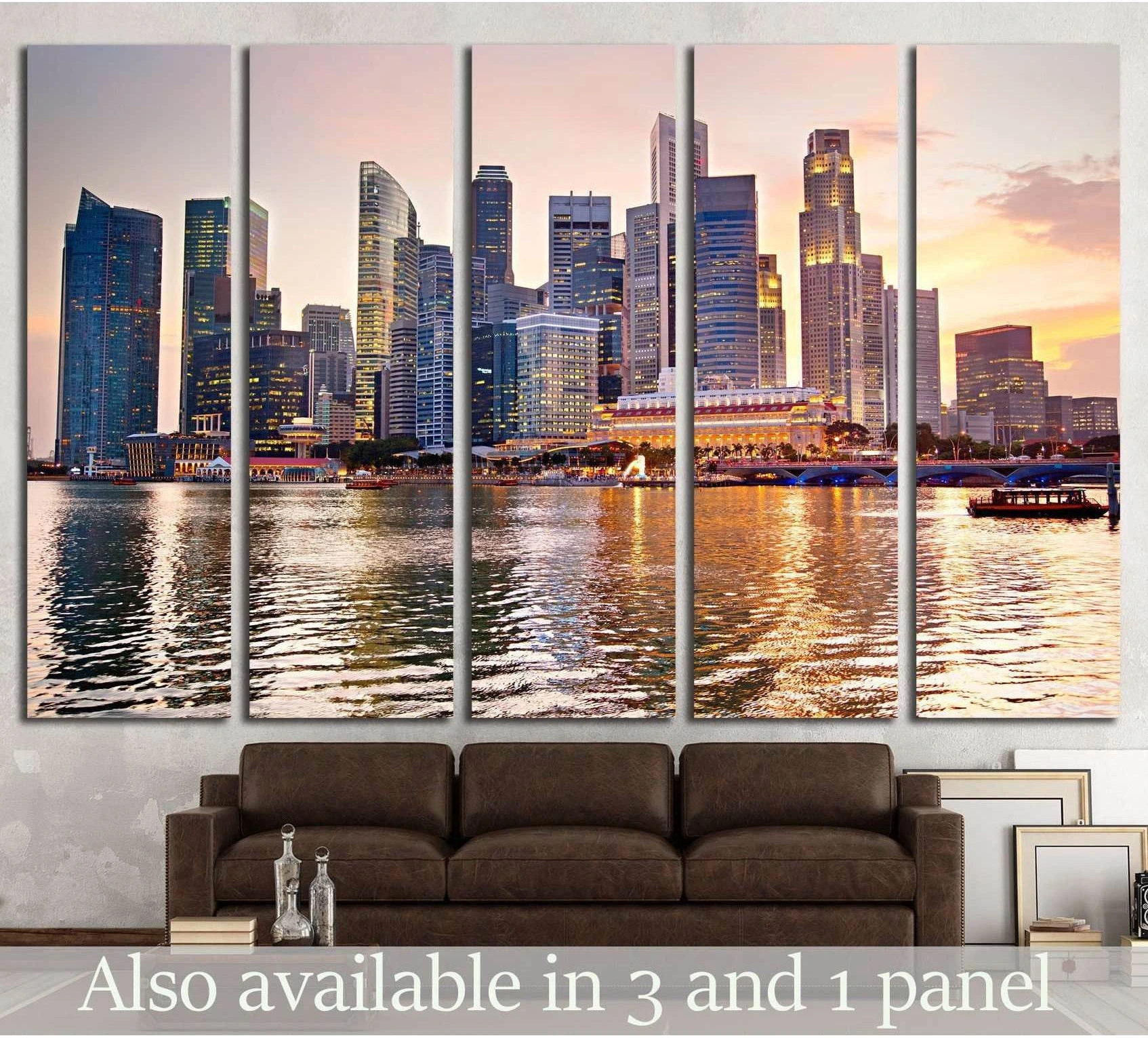 Singapore skyline sunset canvas print with waterfront reflections, displayed as multi-panel wall art above a sofa