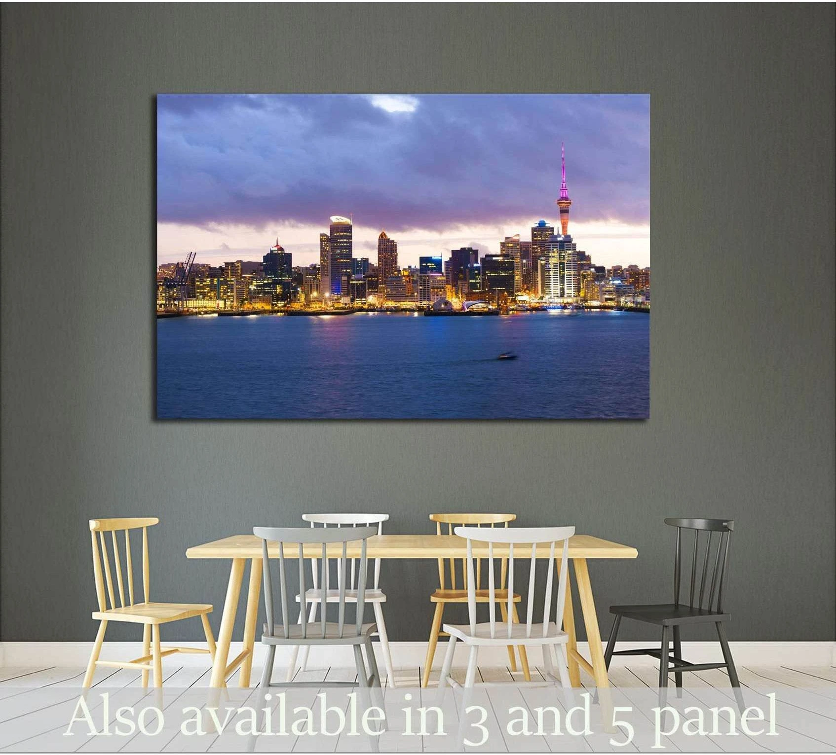 Auckland skyline canvas print with harbor water at dusk hung above a dining table