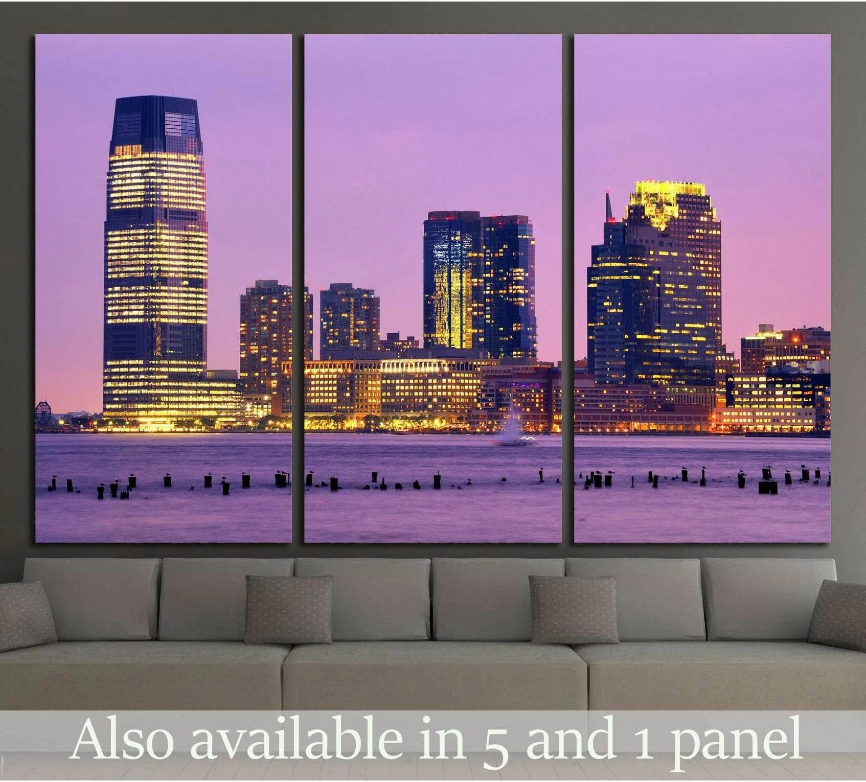 Jersey City skyline canvas print in purple twilight above a sofa in a modern living room