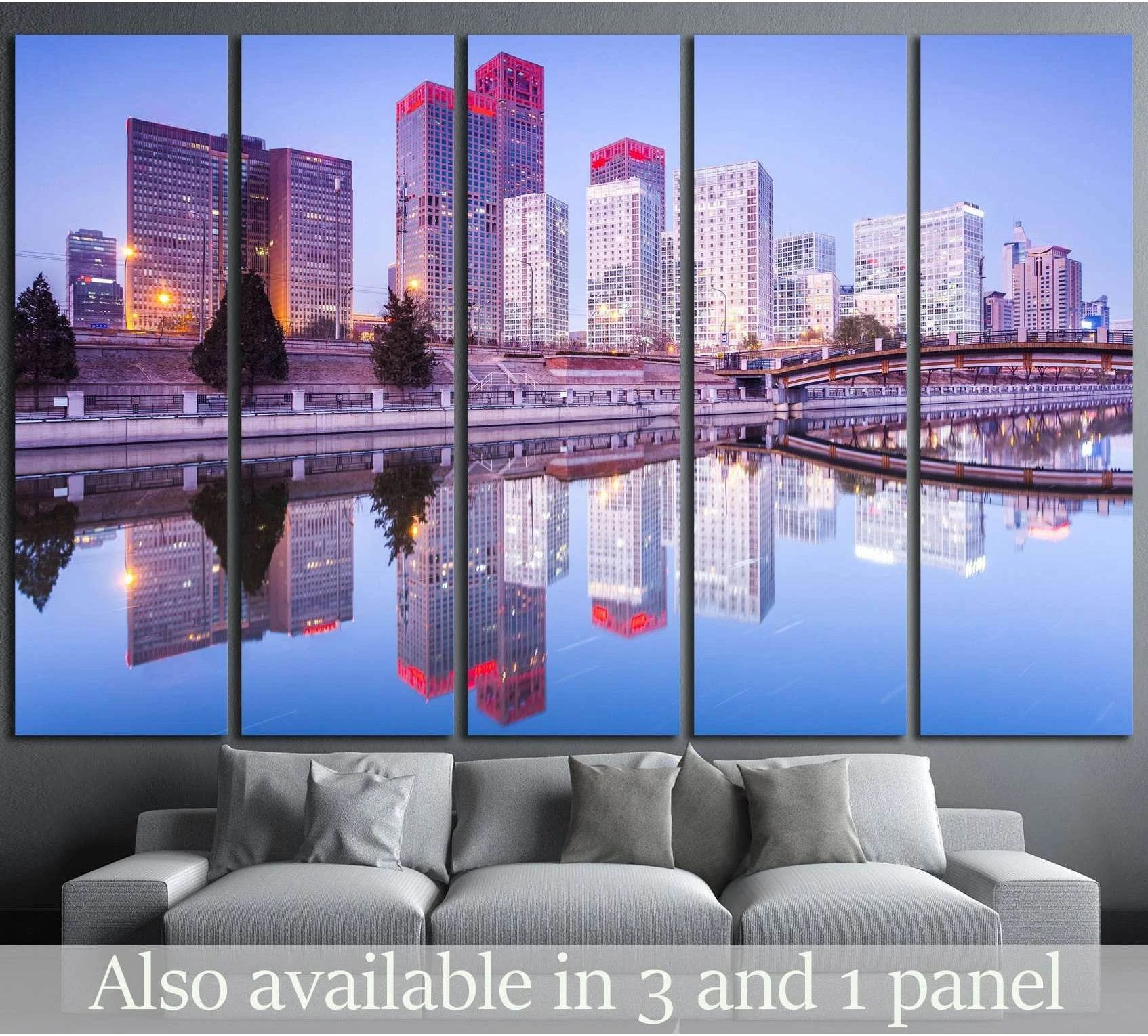 Beijing skyline canvas print with sunset-lit skyscrapers and water reflection above a grey sofa