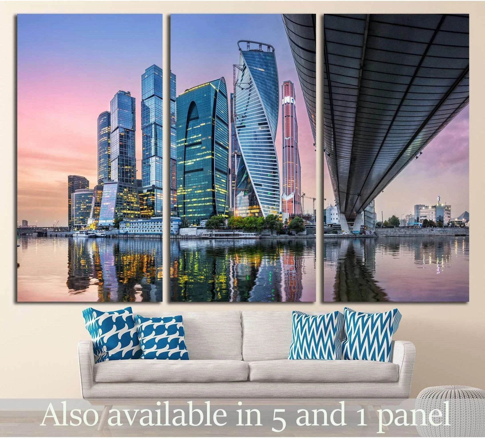 Moscow City skyscraper canvas print with river reflections above sofa in modern living room