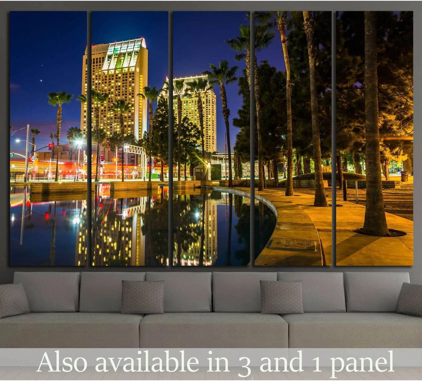 San Diego skyline canvas print with palm trees and waterfront reflections above a sofa
