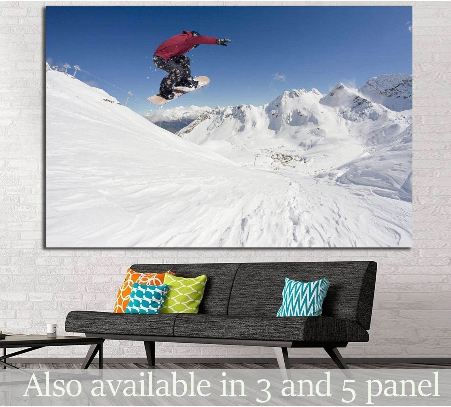 Snowboarder canvas print showing a rider mid-air above snowy alpine peaks in a modern living room mockup