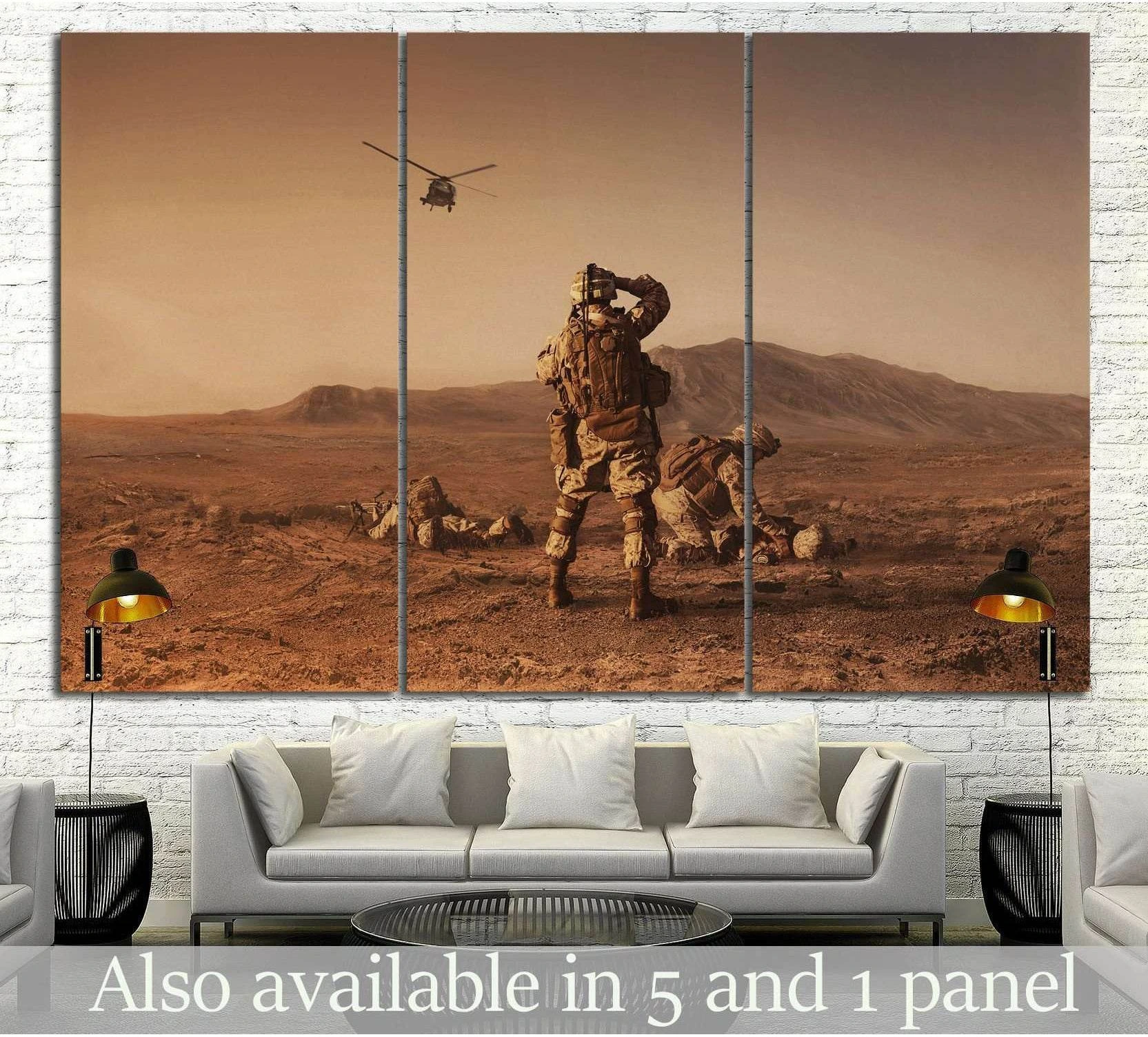 Sepia military canvas print with soldier and helicopter in desert triptych above a sofa