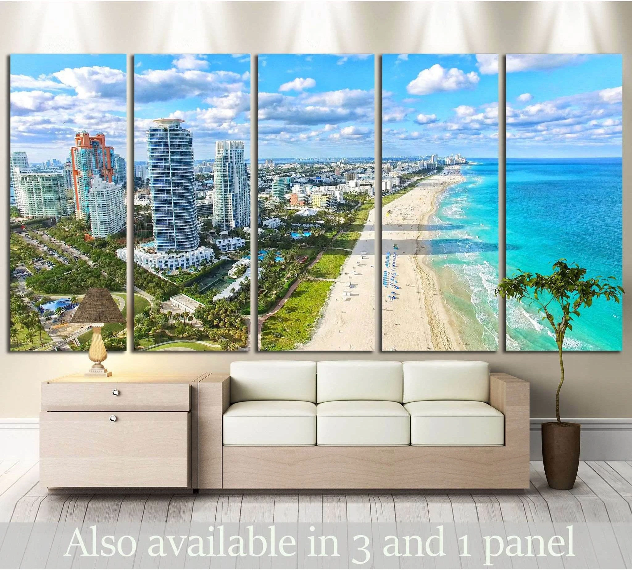 South Beach Miami canvas print showing skyline, sandy beach, and turquoise ocean above a sofa