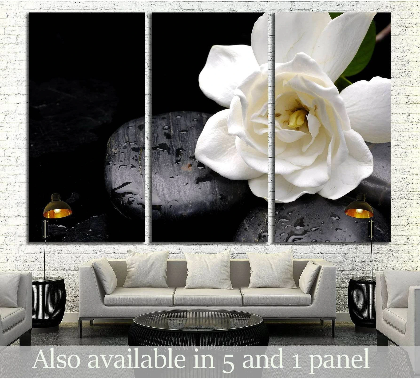 White gardenia on wet black stones triptych canvas print above sofa in modern living room