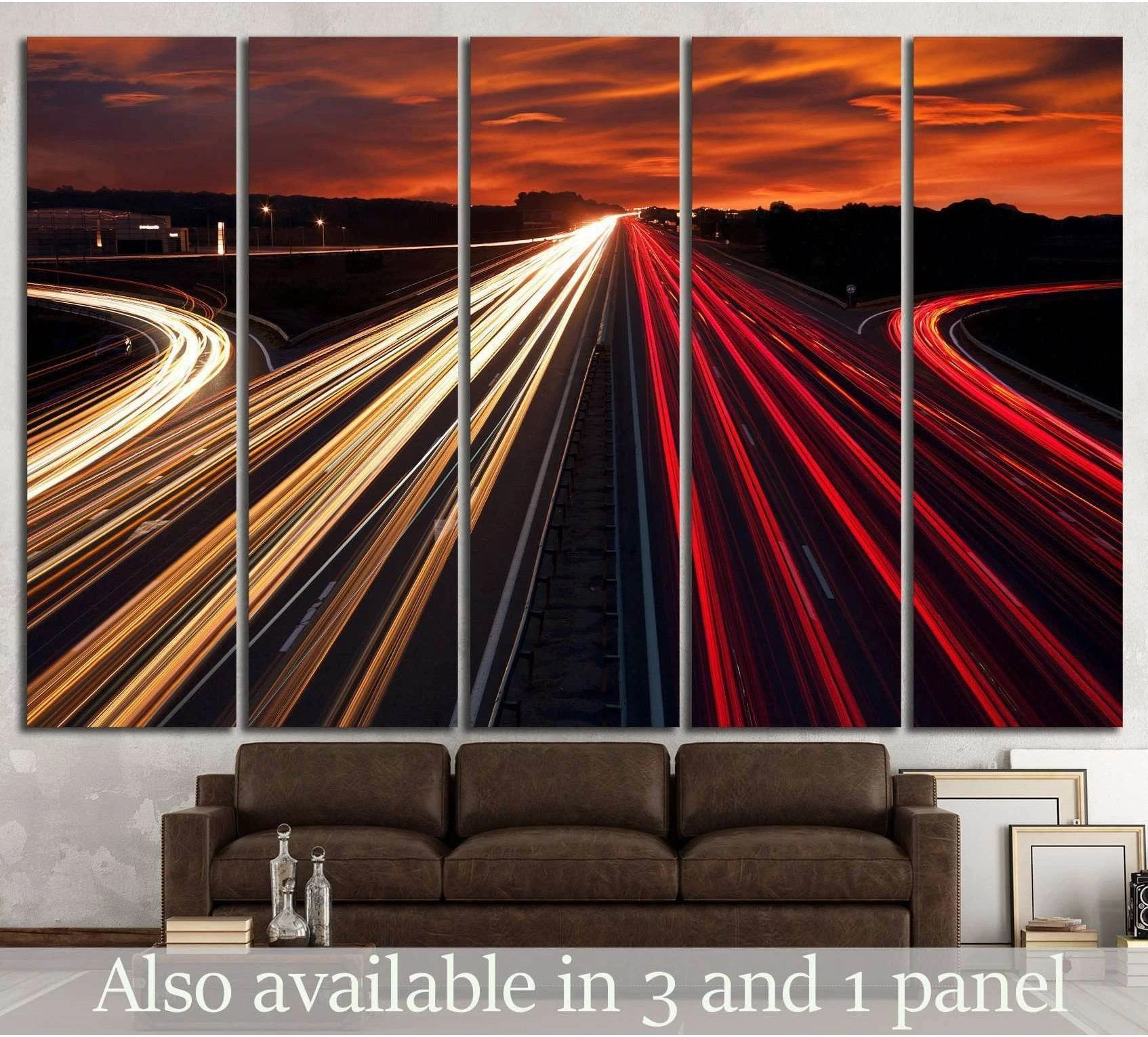 Highway light trails canvas print above sofa in modern living room at sunset