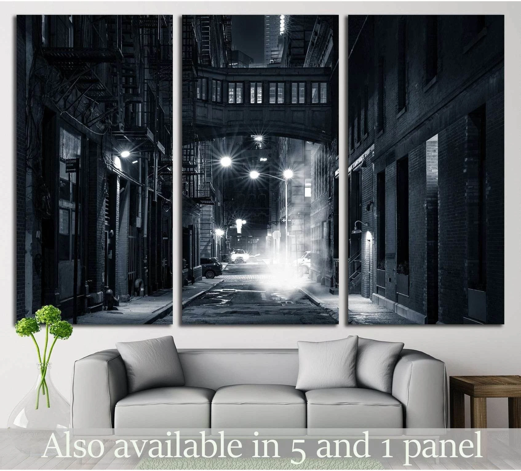 Black and white Tribeca skybridge canvas print showing Staple Street alley at night in a modern living room