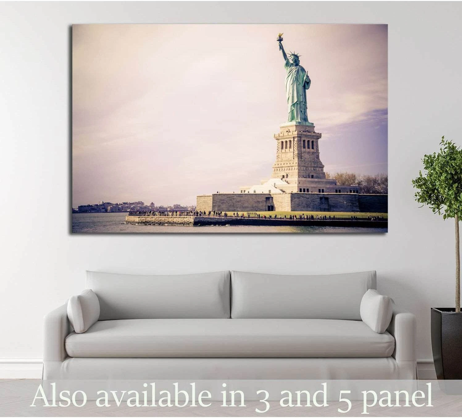 Statue of Liberty canvas print in soft pastel tones above a sofa in a modern living room