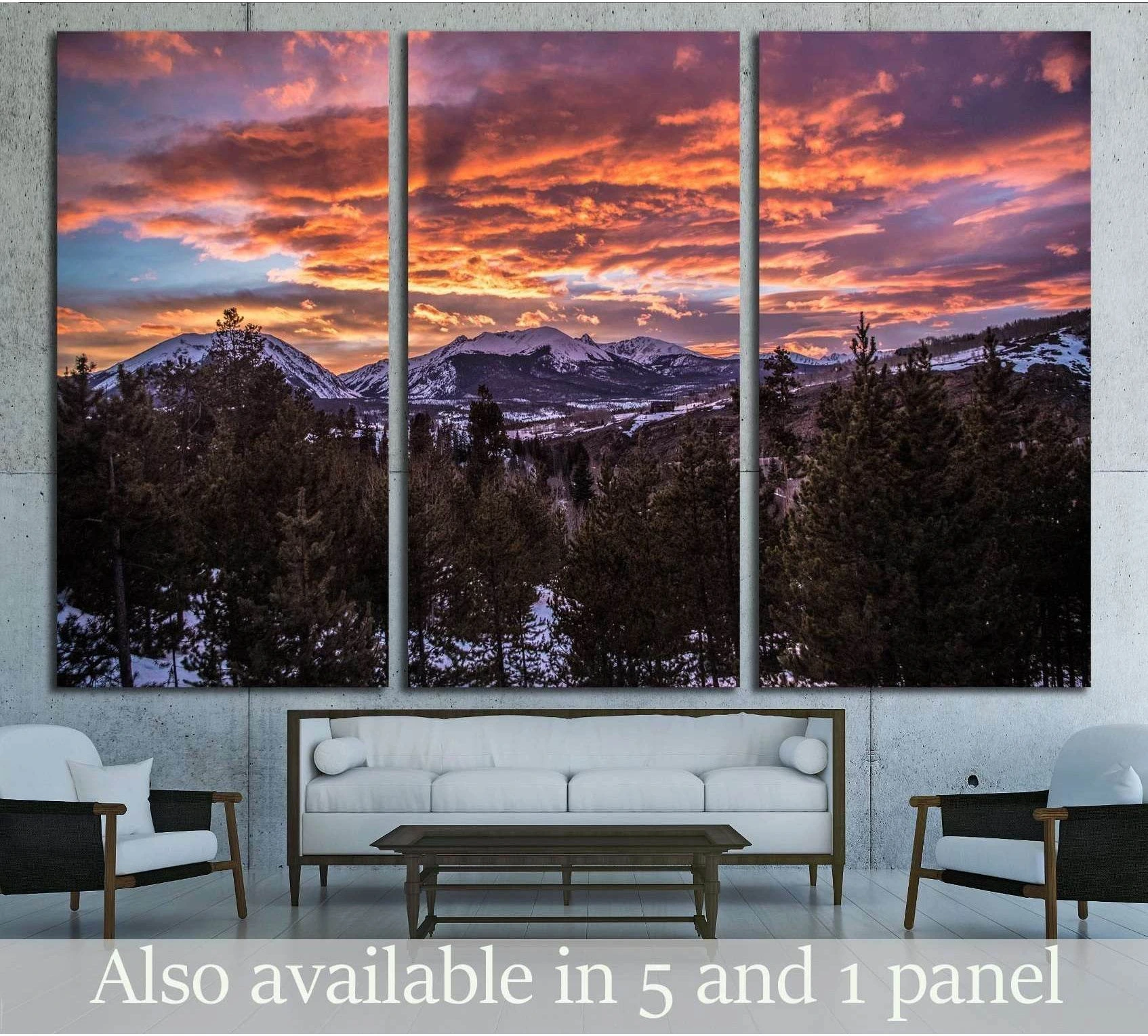 Sunset mountain forest canvas print triptych hung above a sofa in a modern living room