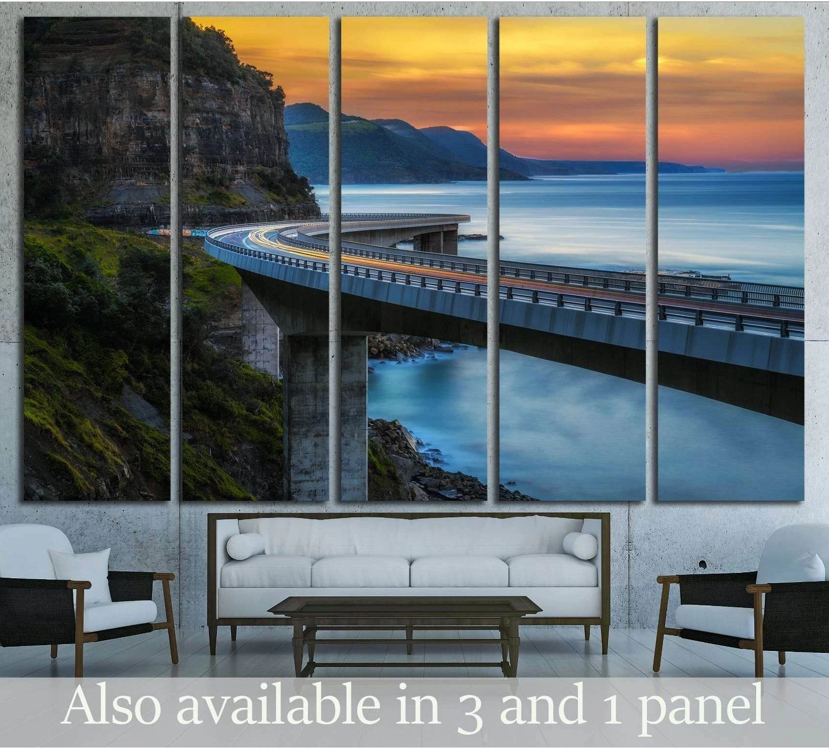 Sea Cliff Bridge sunset multi-panel canvas print above sofa in a modern living room