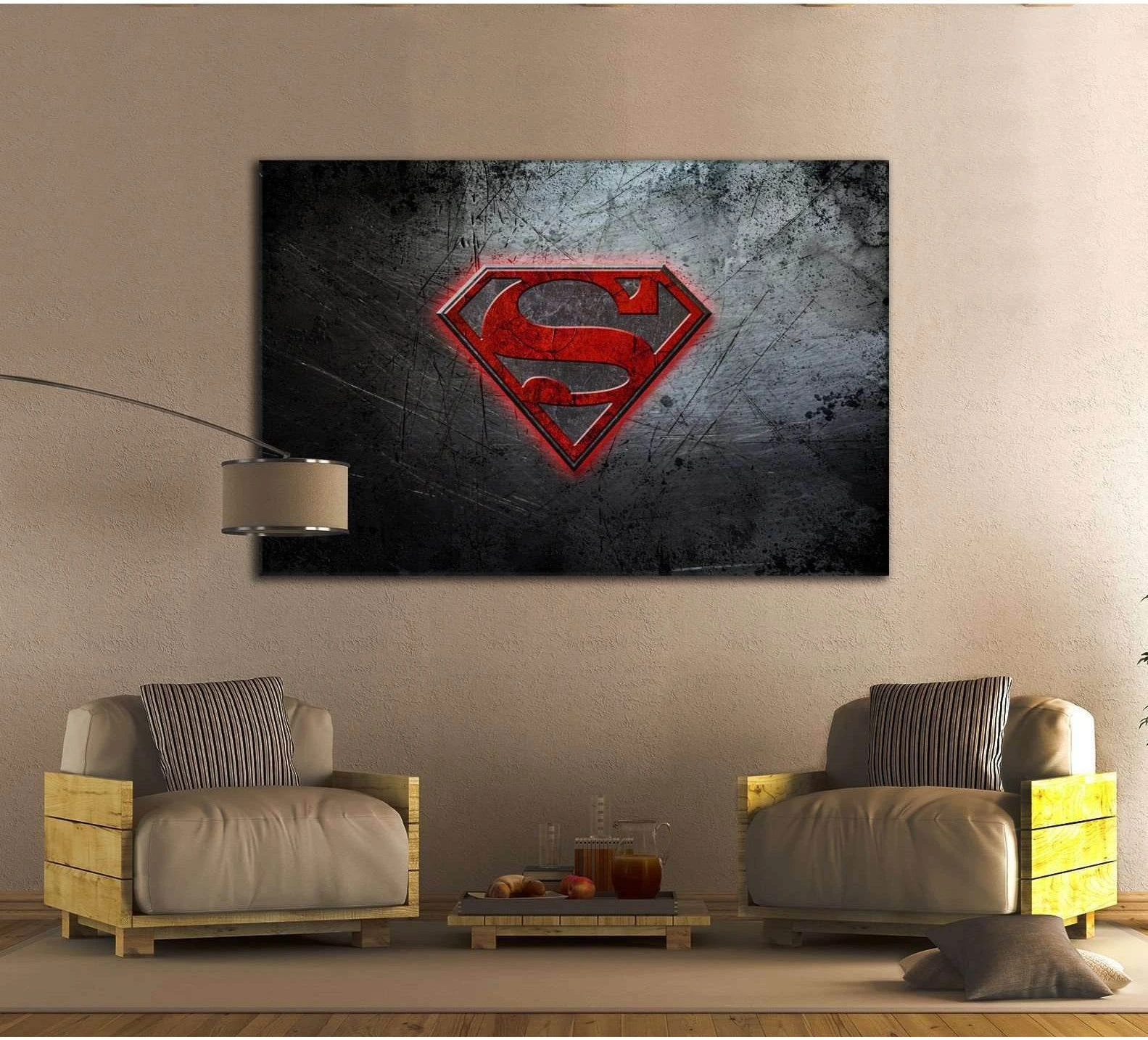 Red Superman logo canvas print on a dark grunge background above chairs in a modern living room