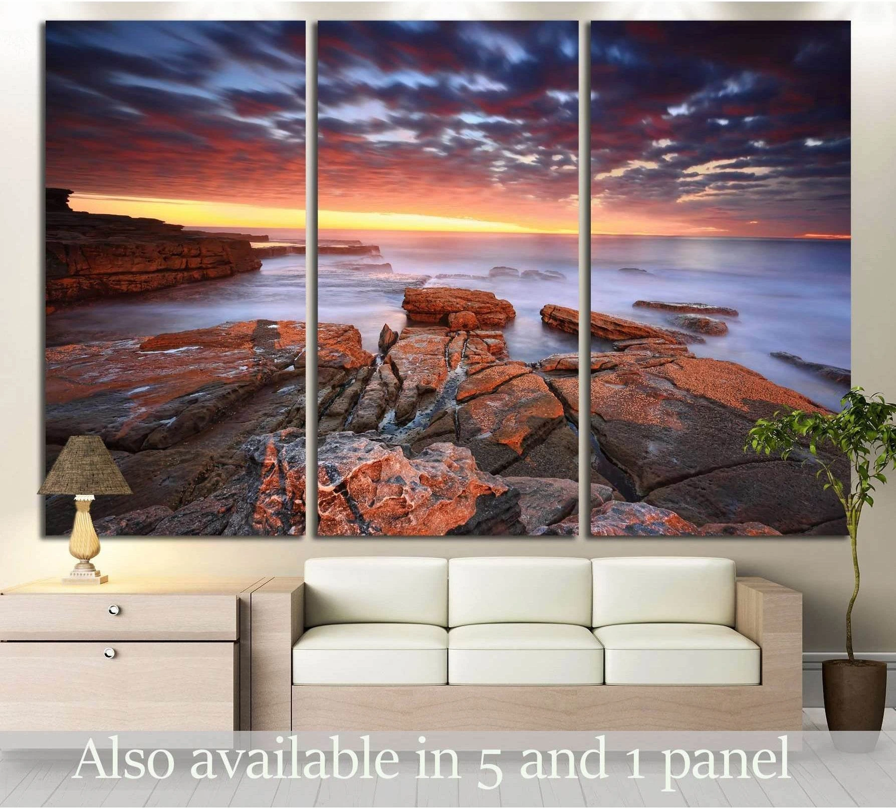 Swift movement in the clouds as they swept in fast showing blue ocean wall art with water and coastal depth.