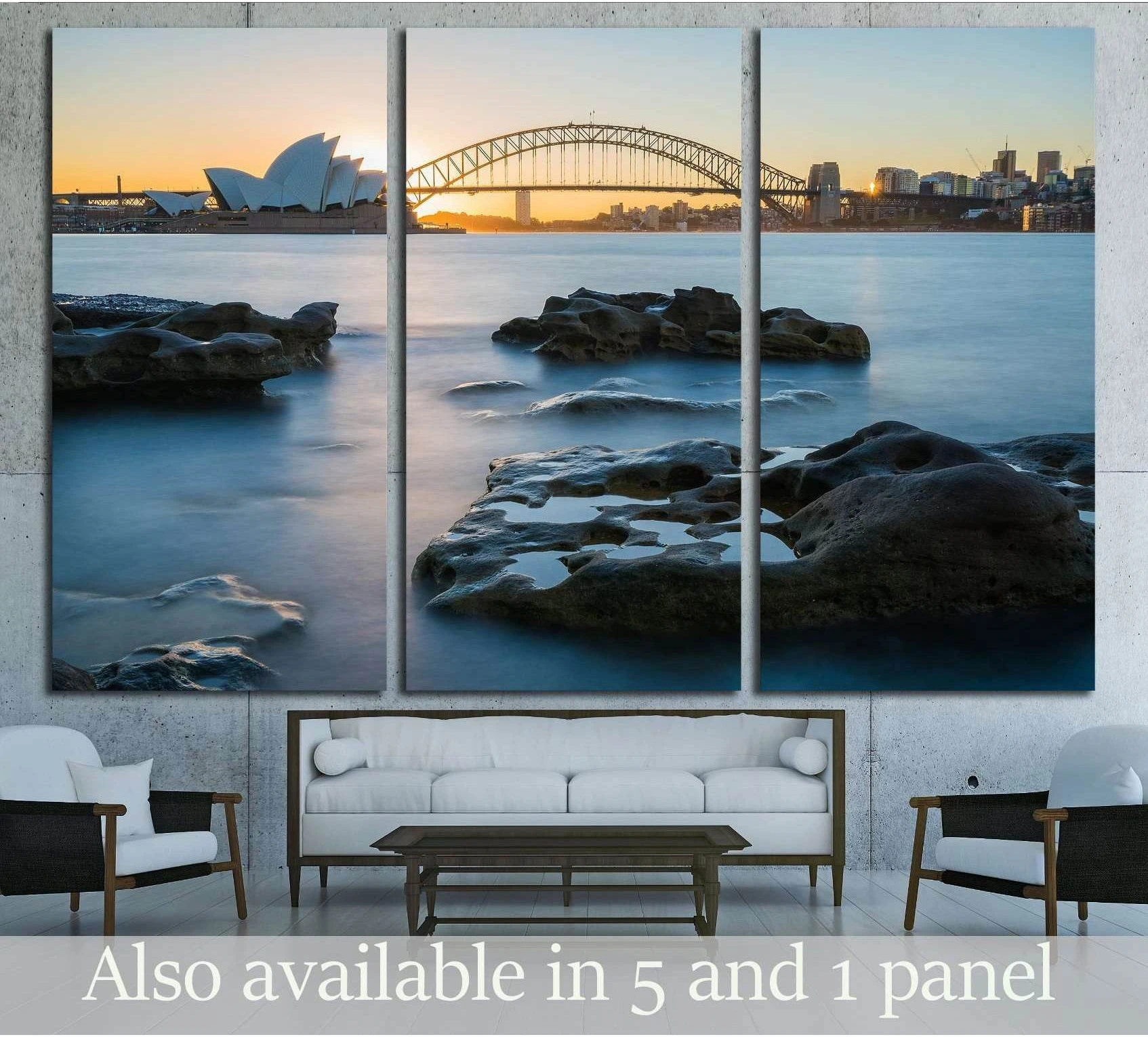 Sydney Opera House and Harbour Bridge sunset canvas print displayed as triptych above a sofa in a modern living room