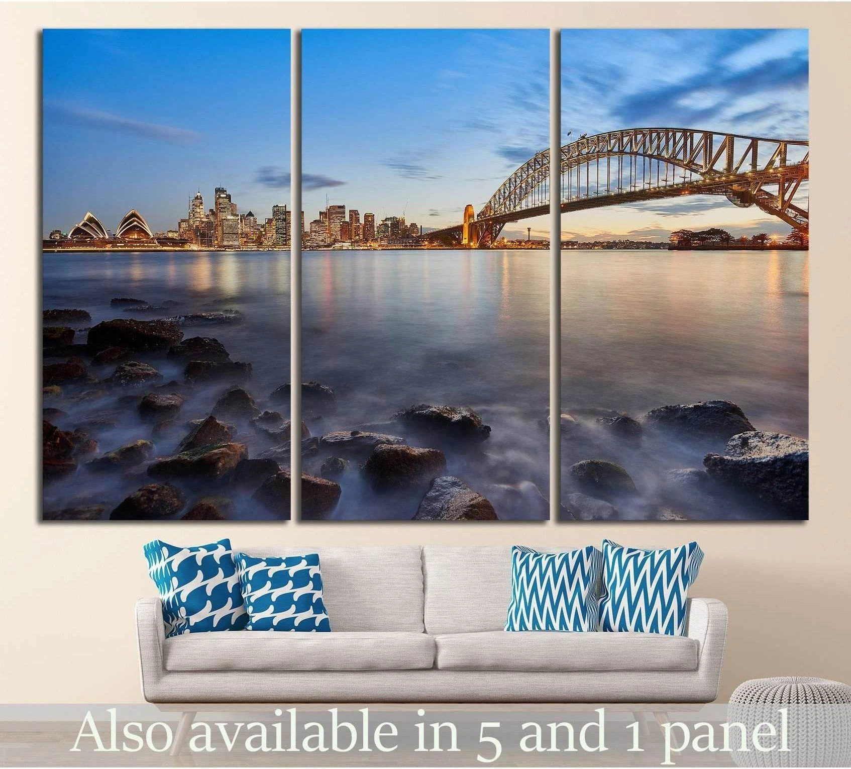 Sydney Harbour Bridge and Opera House triptych canvas print above sofa in a modern living room