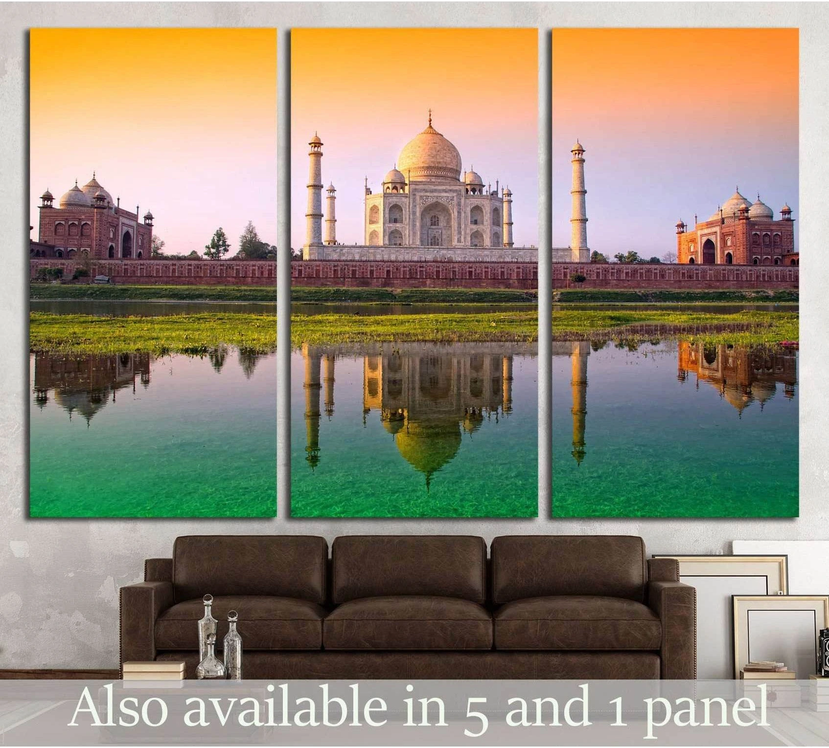 Taj Mahal triptych canvas print with reflection above sofa in a modern living room