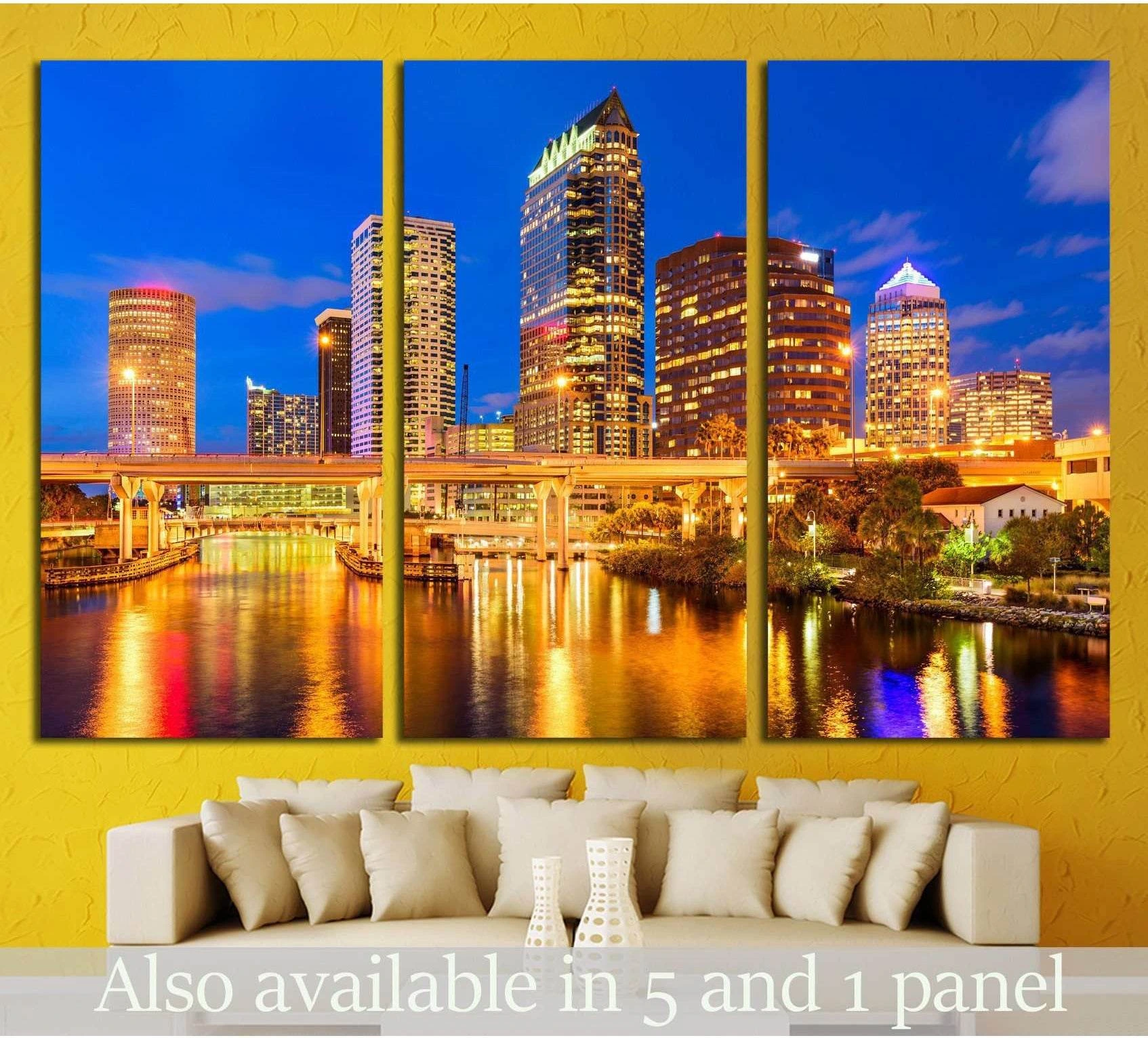 Tampa skyline triptych canvas print with golden river reflections above a sofa