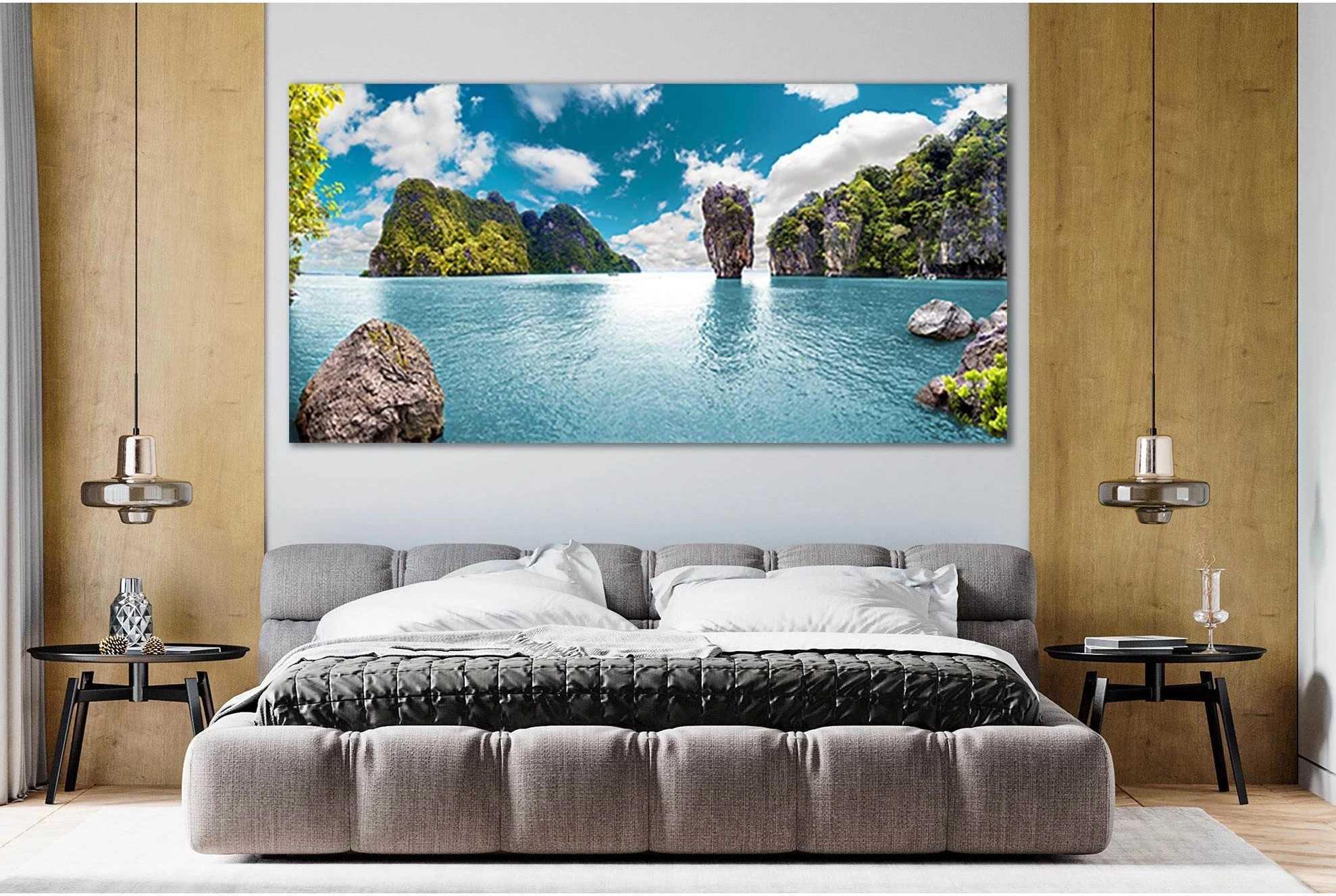 Turquoise ocean seascape with green islands, rocky cliffs and white clouds under a blue sky detail view