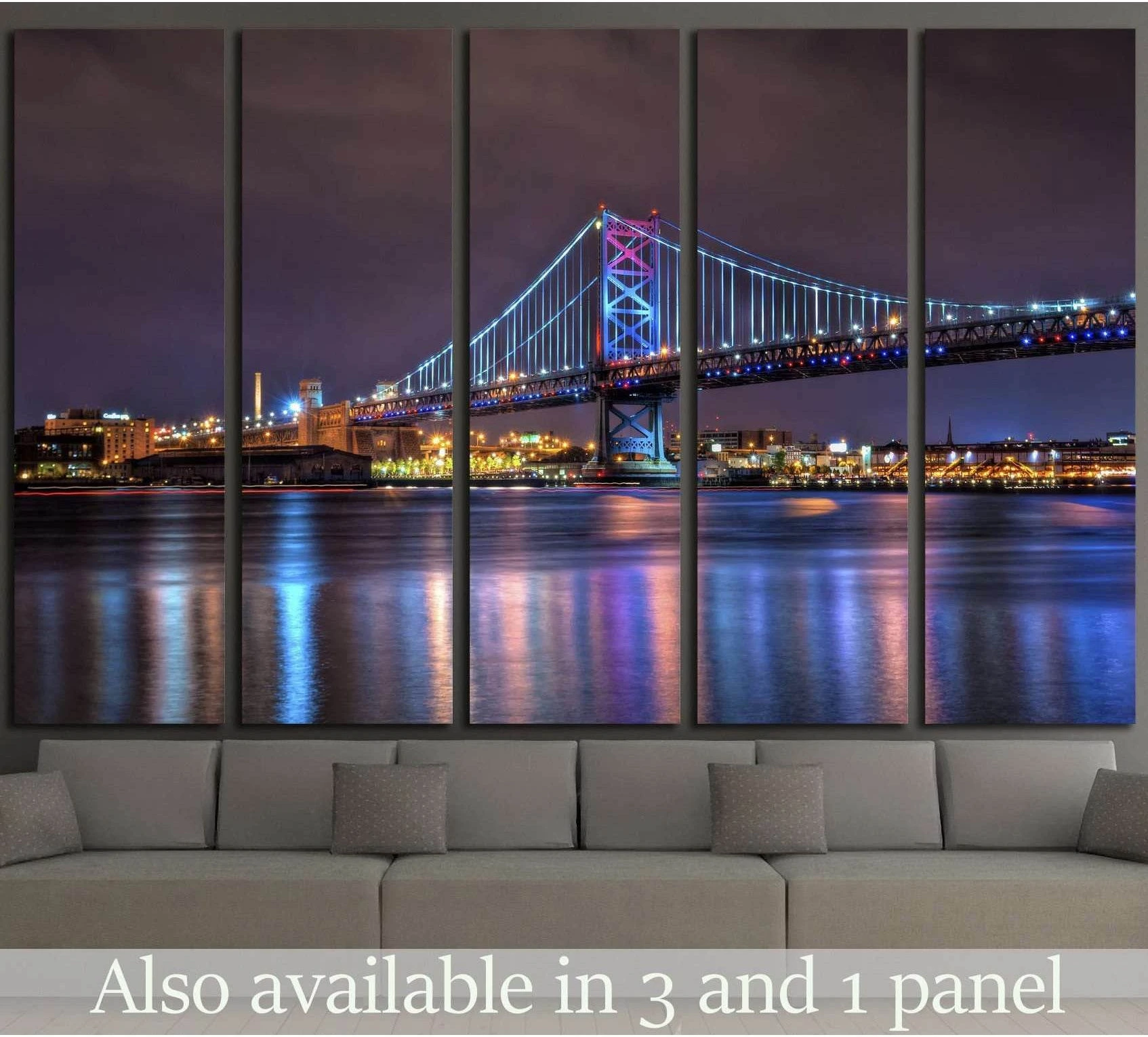 Benjamin Franklin Bridge night canvas print with blue and purple river reflections above a sofa