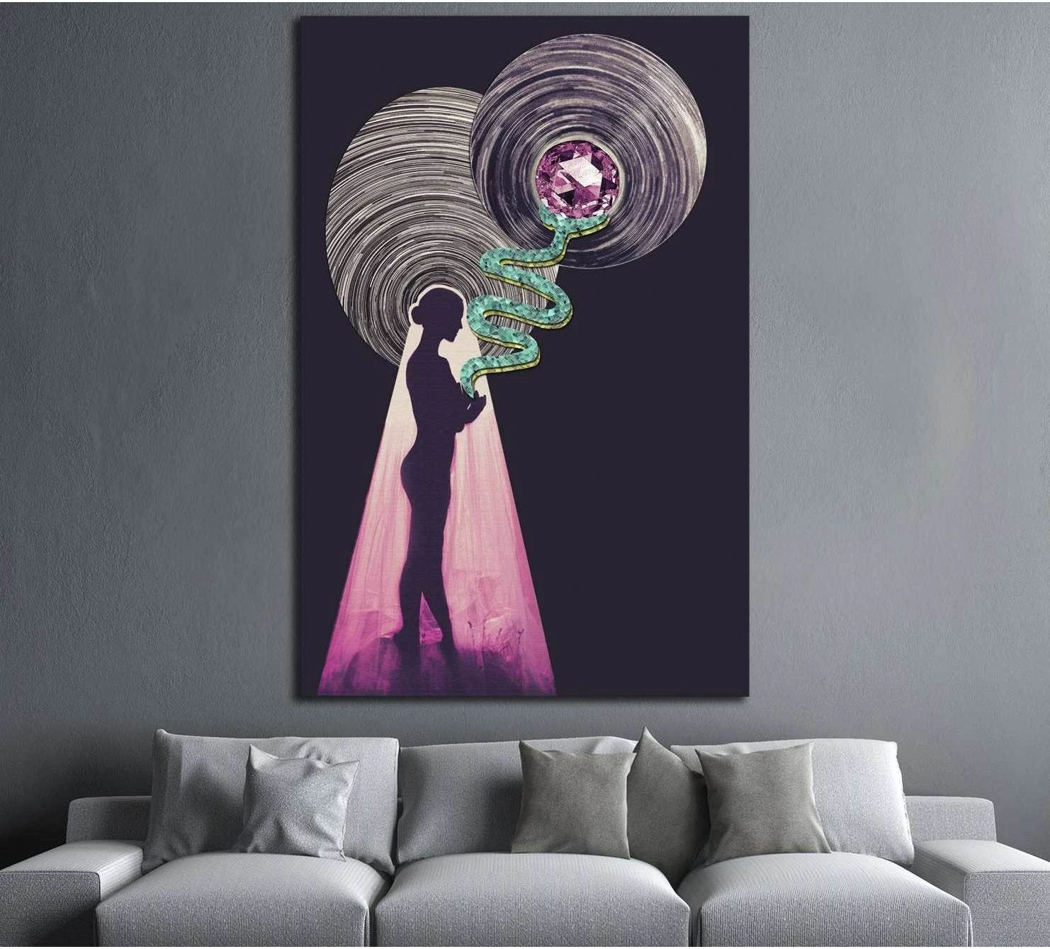 Surreal silhouette canvas print with purple gemstone, coiled snake, and pink light above a sofa