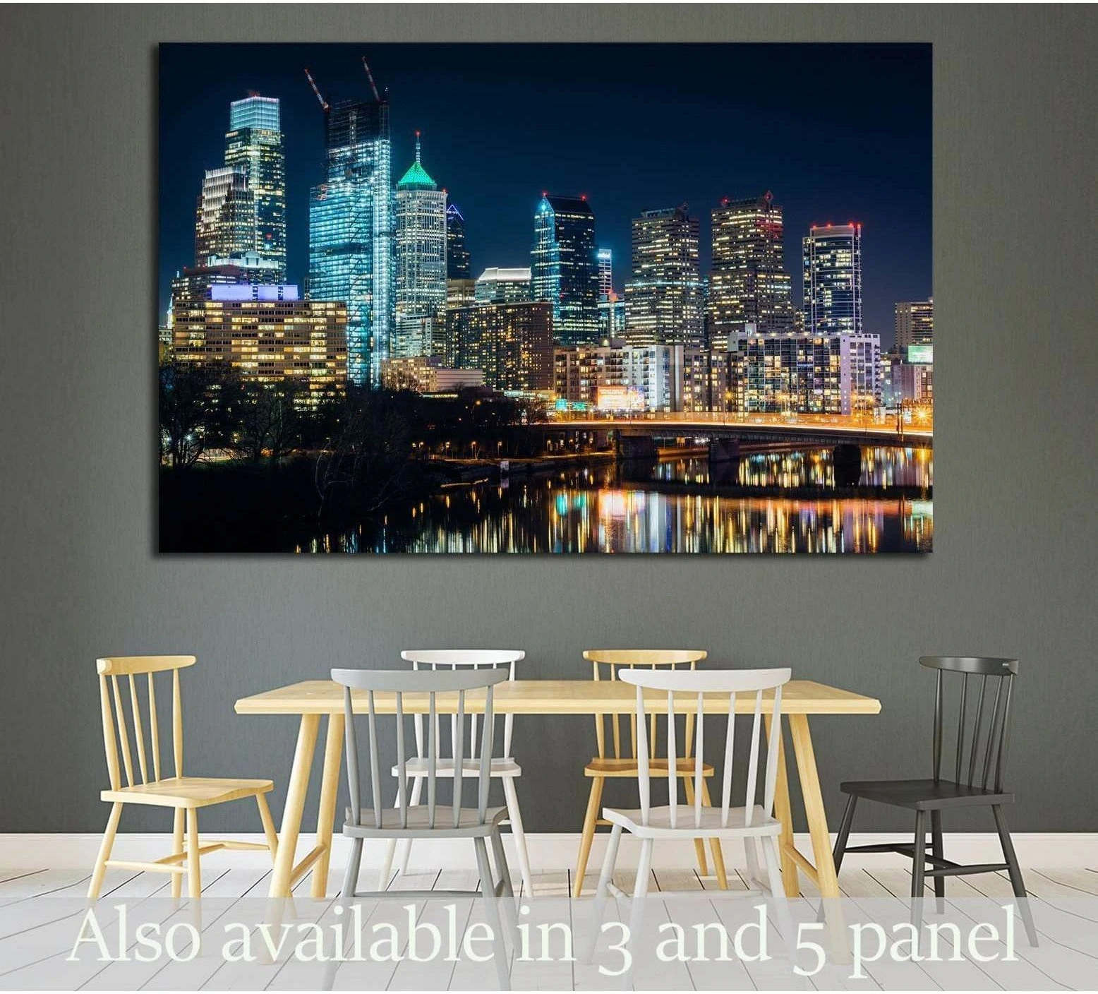 Philadelphia skyline canvas print above dining table with Schuylkill River reflections at night