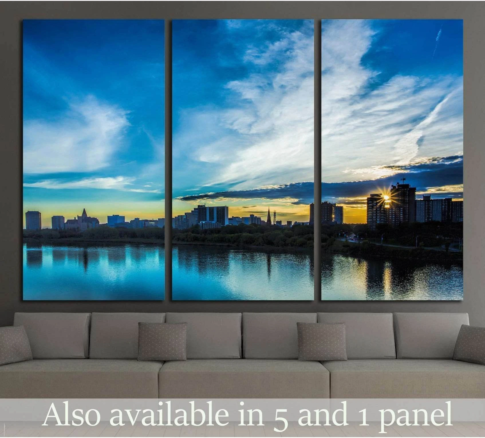 Saskatoon skyline sunset canvas print above sofa with river reflections in a modern living room