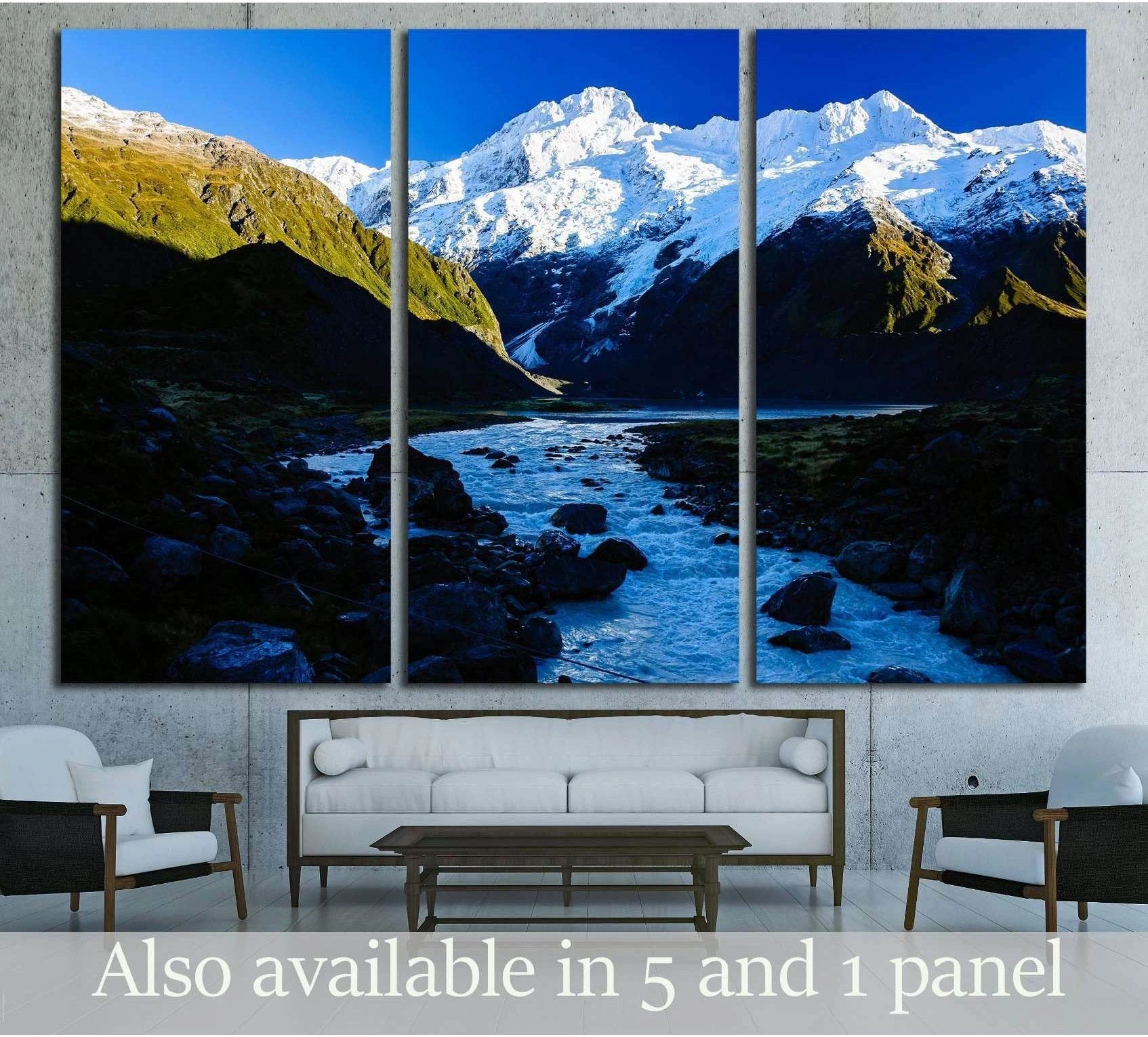 Mount Cook Hooker Valley canvas print with snowy peaks, alpine river, and blue sky above a living room sofa
