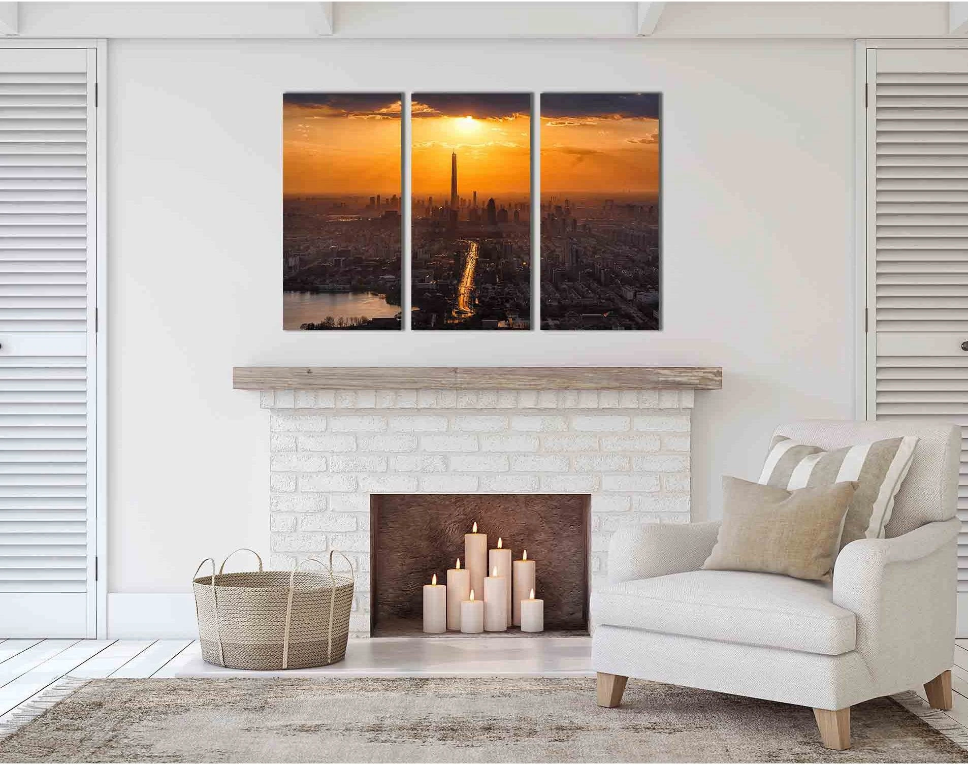 Sunset city skyline with a tall tower, glowing golden sun, and river reflections at dusk detail view