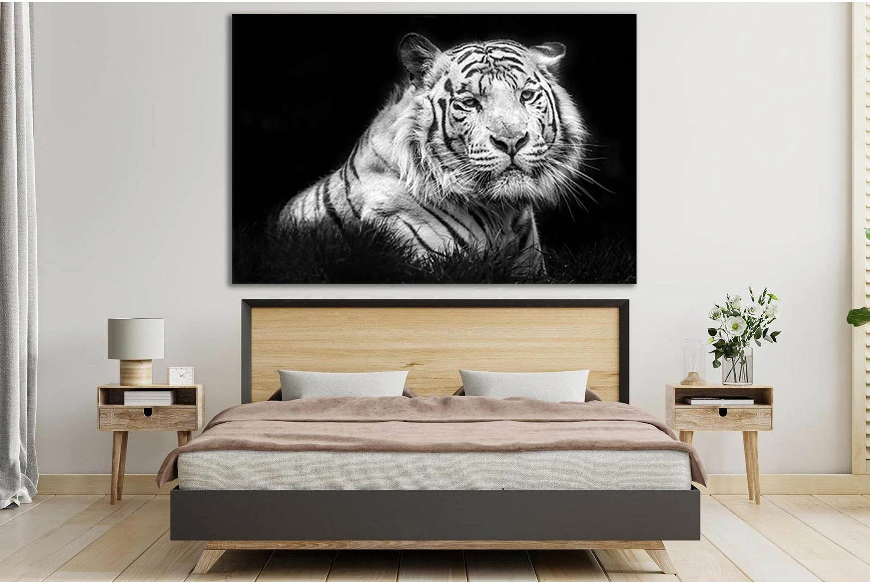 Black and white tiger face split across three vertical panels with sharp eyes and stripes detail view