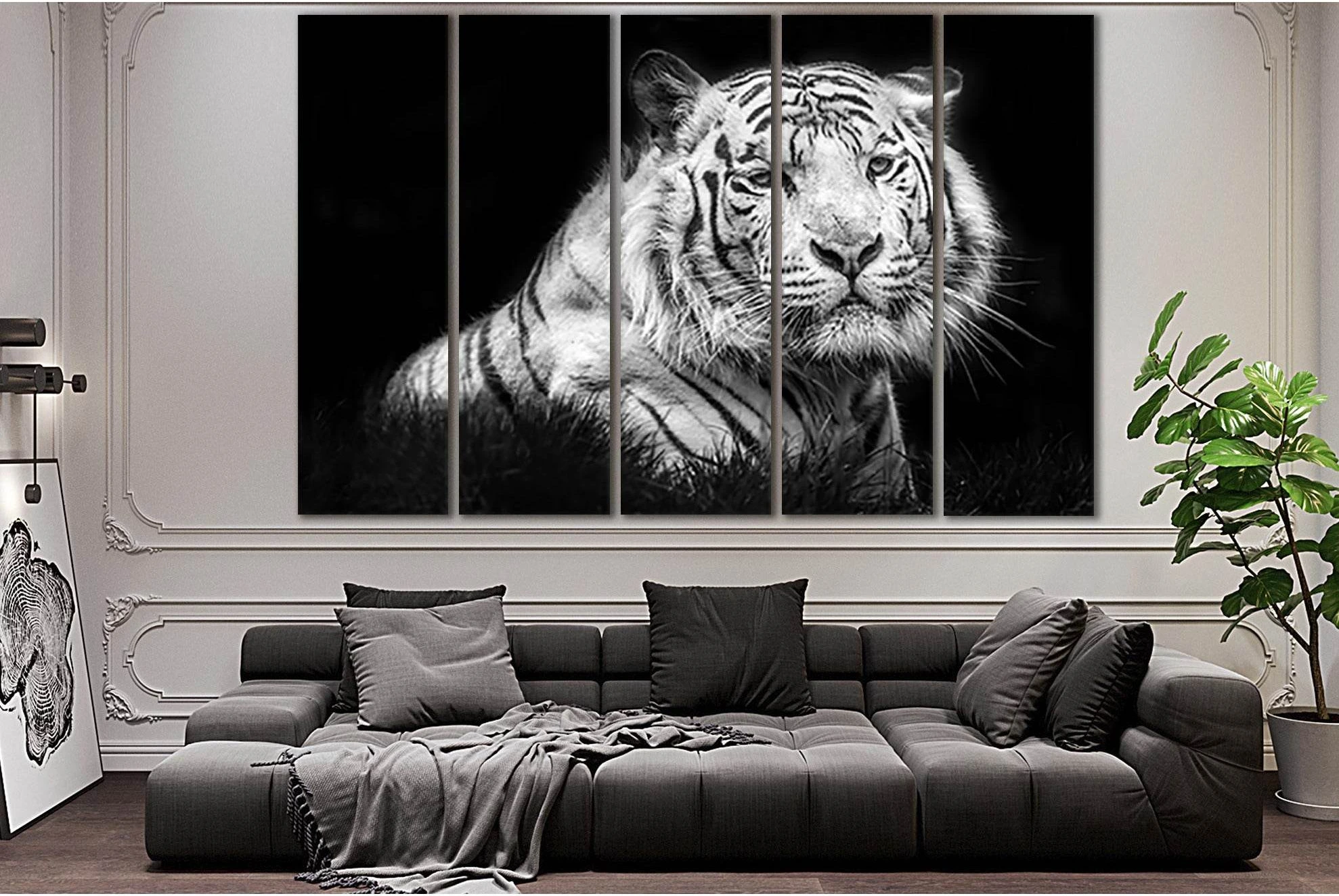 Black and white tiger face split across three vertical panels with sharp eyes and stripes detail view