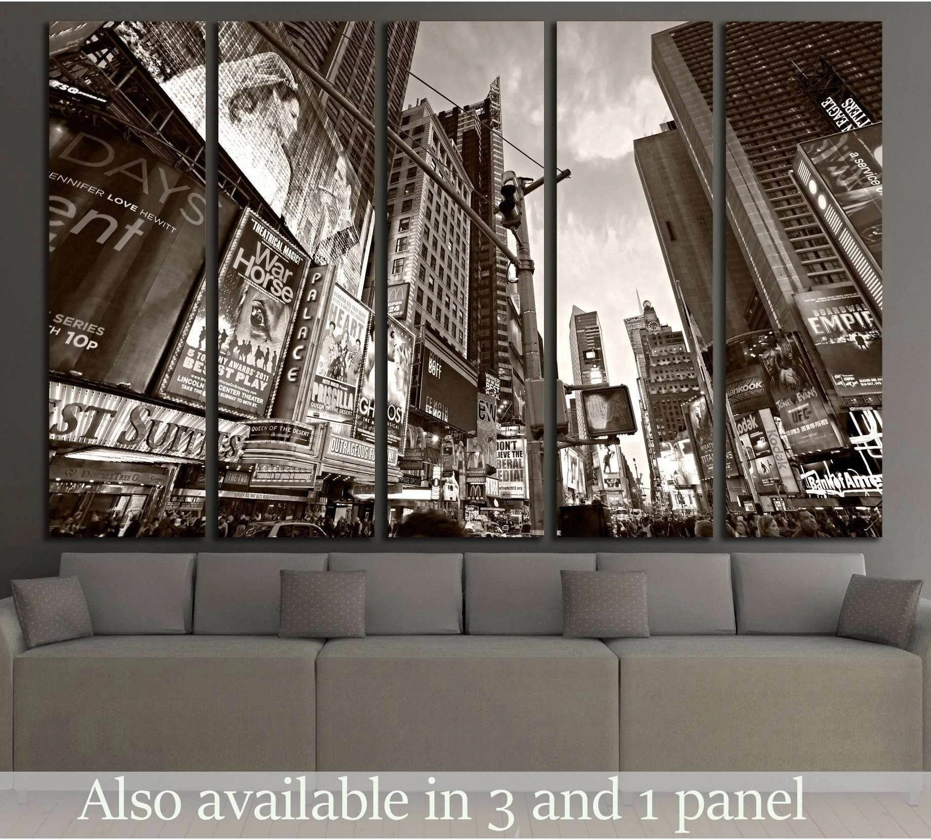Sepia Times Square canvas print with Broadway signs hung above a sofa in a modern living room